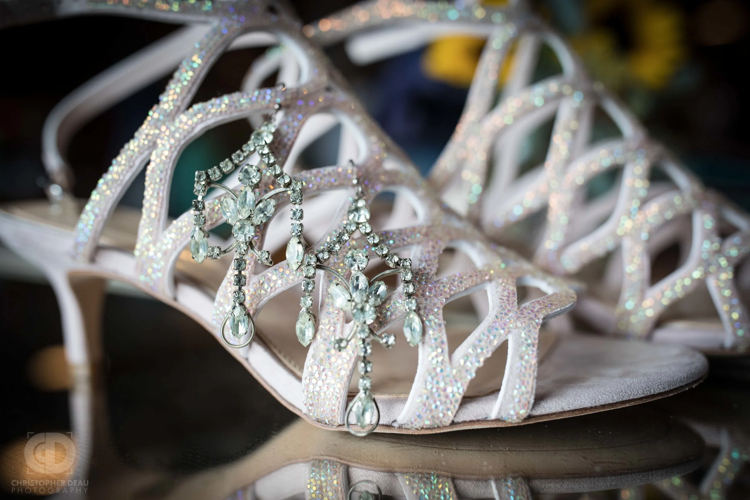 The brides shoes with antique earrings