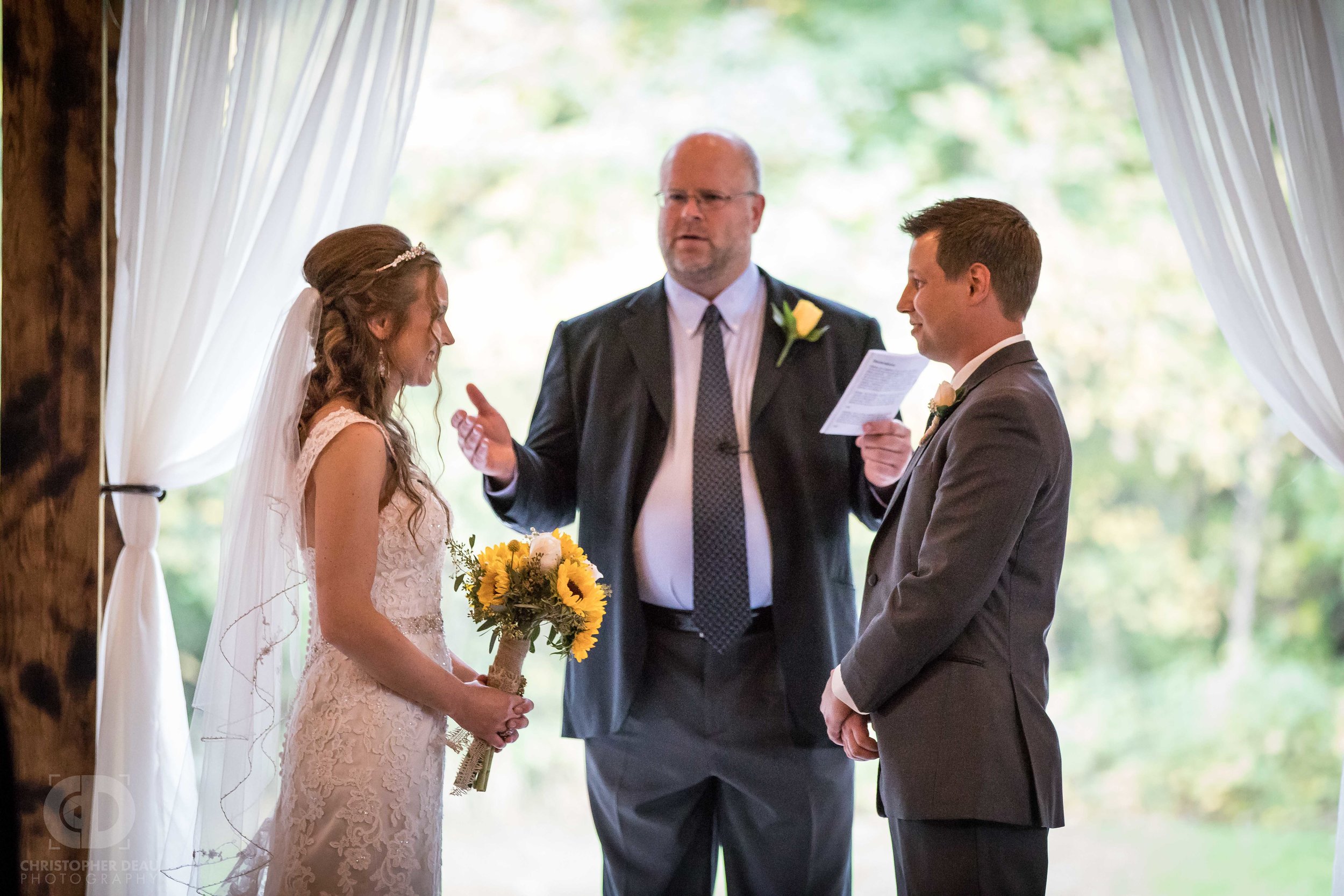  bride and groom during ceremony 