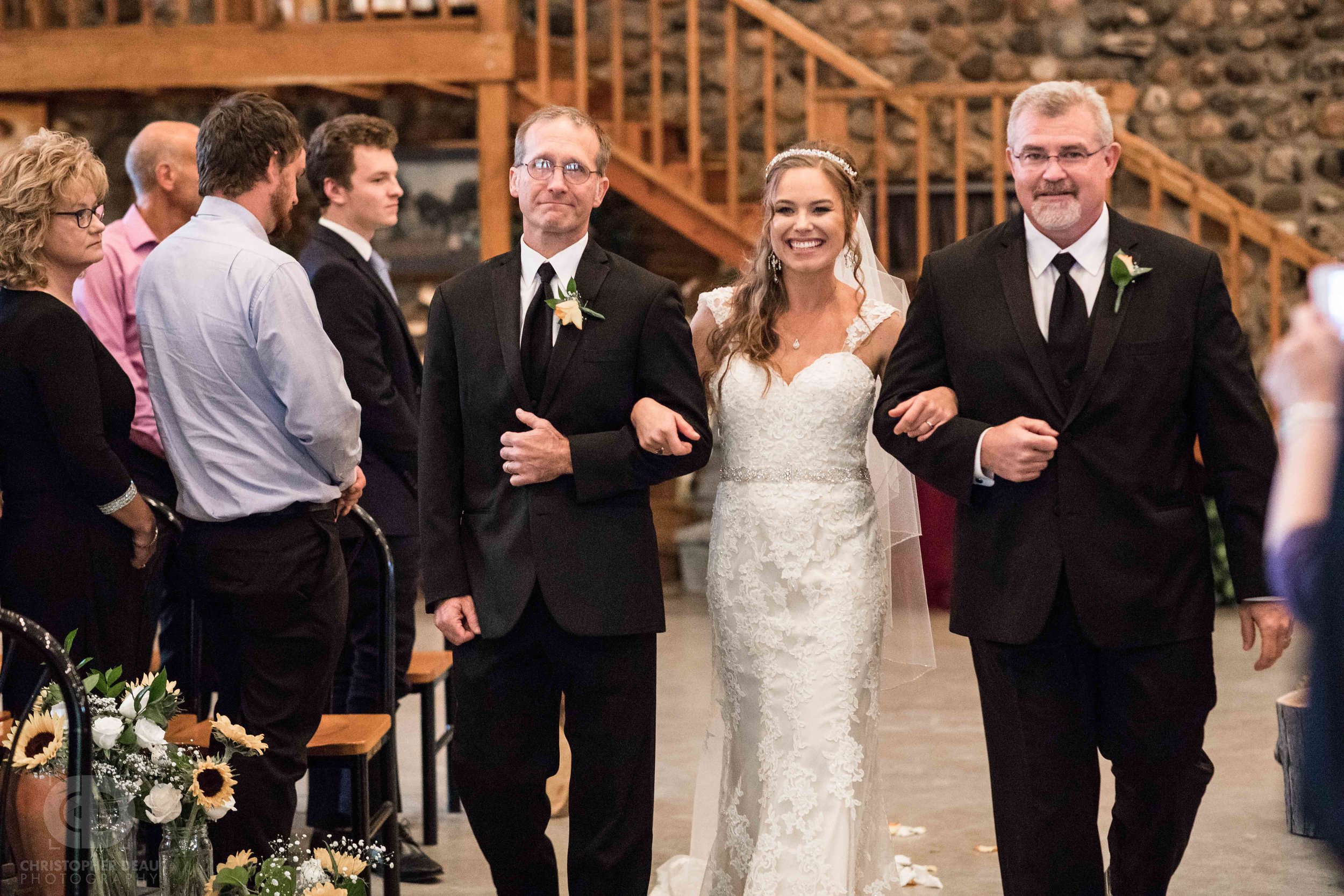  Bride being walked down the isle 