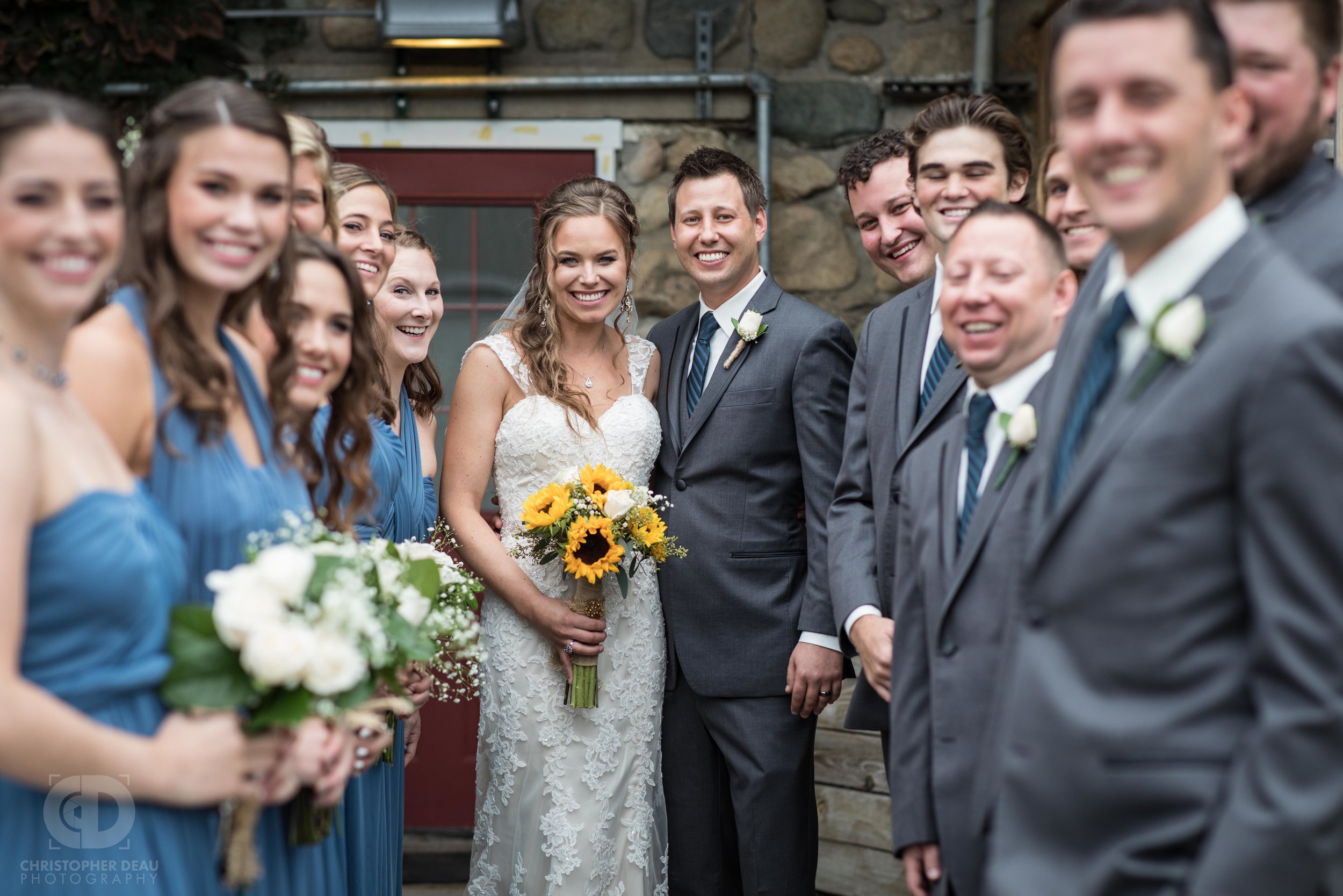  bride and groom with entire wedding party 