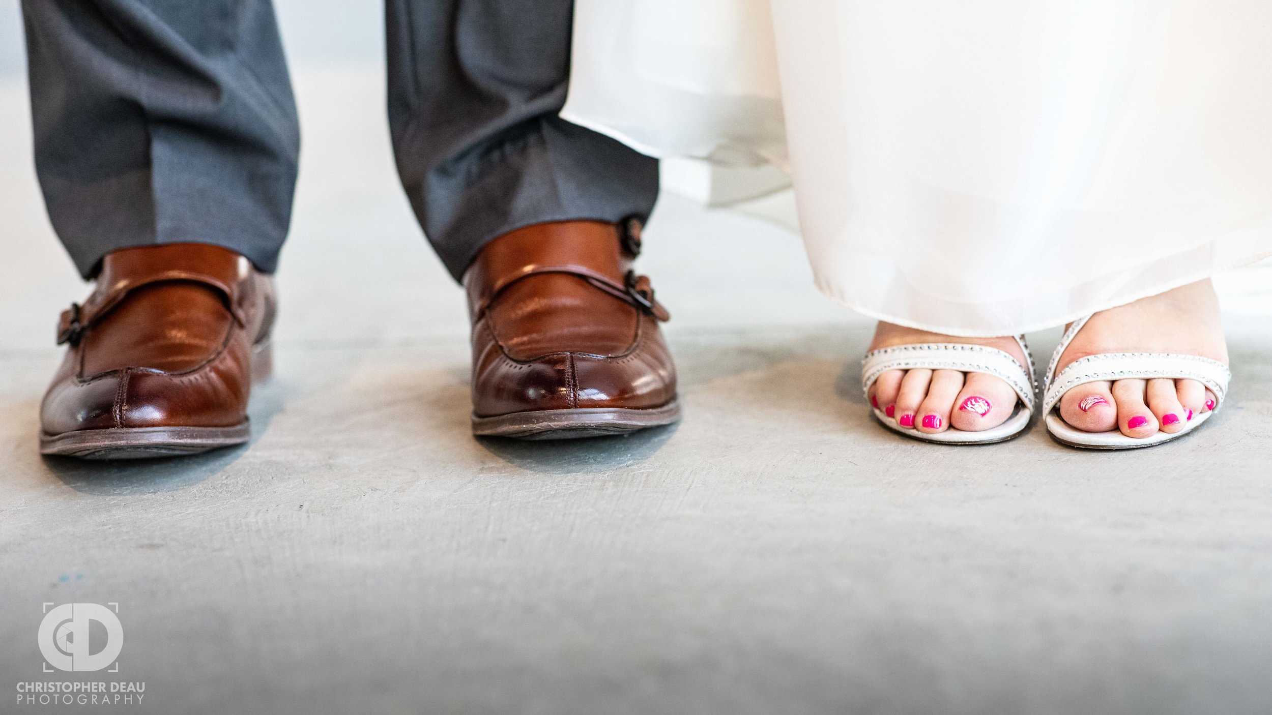  his and her shoes at their wedding 