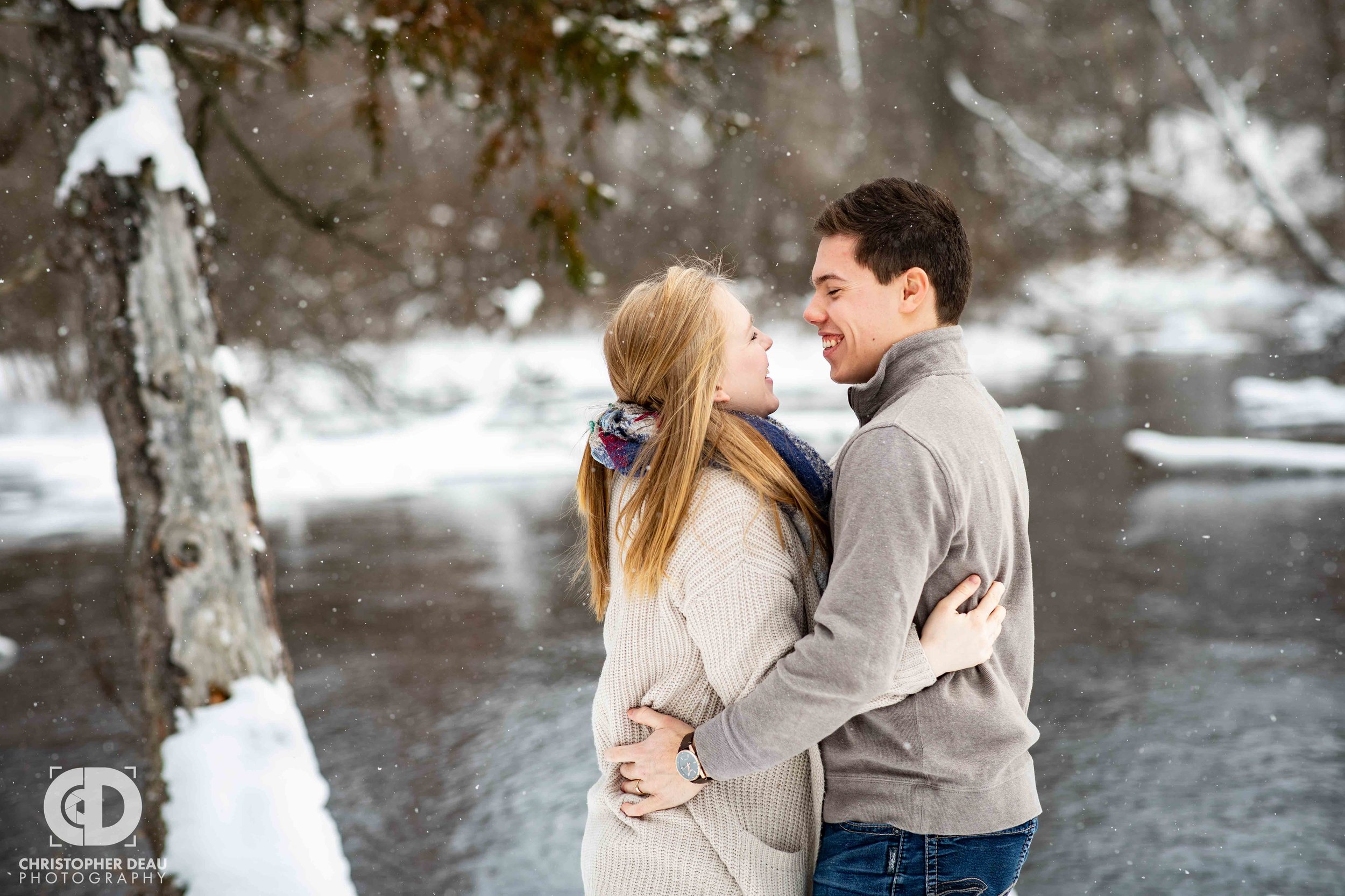  Michigan winter stream in Kalamazoo for engagement session 