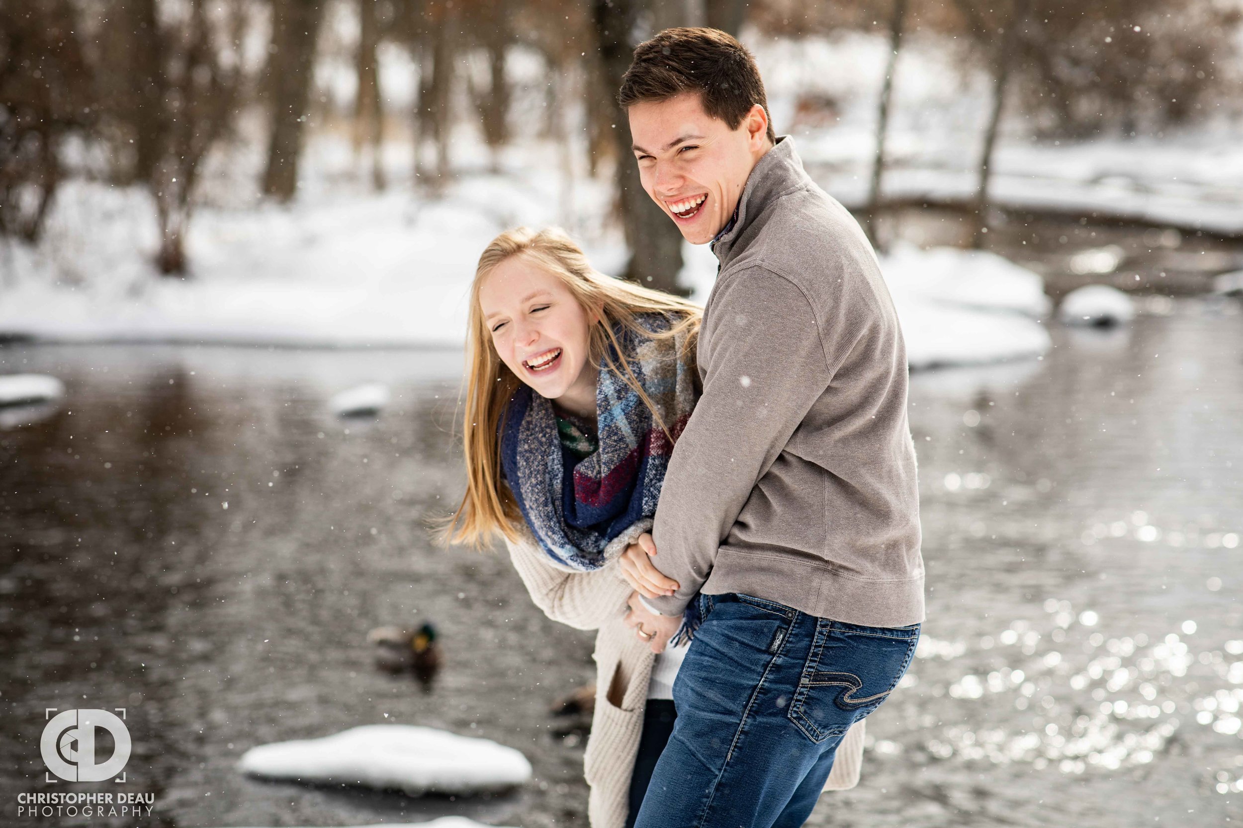  laughing during engagement photos in southwest Michigan 