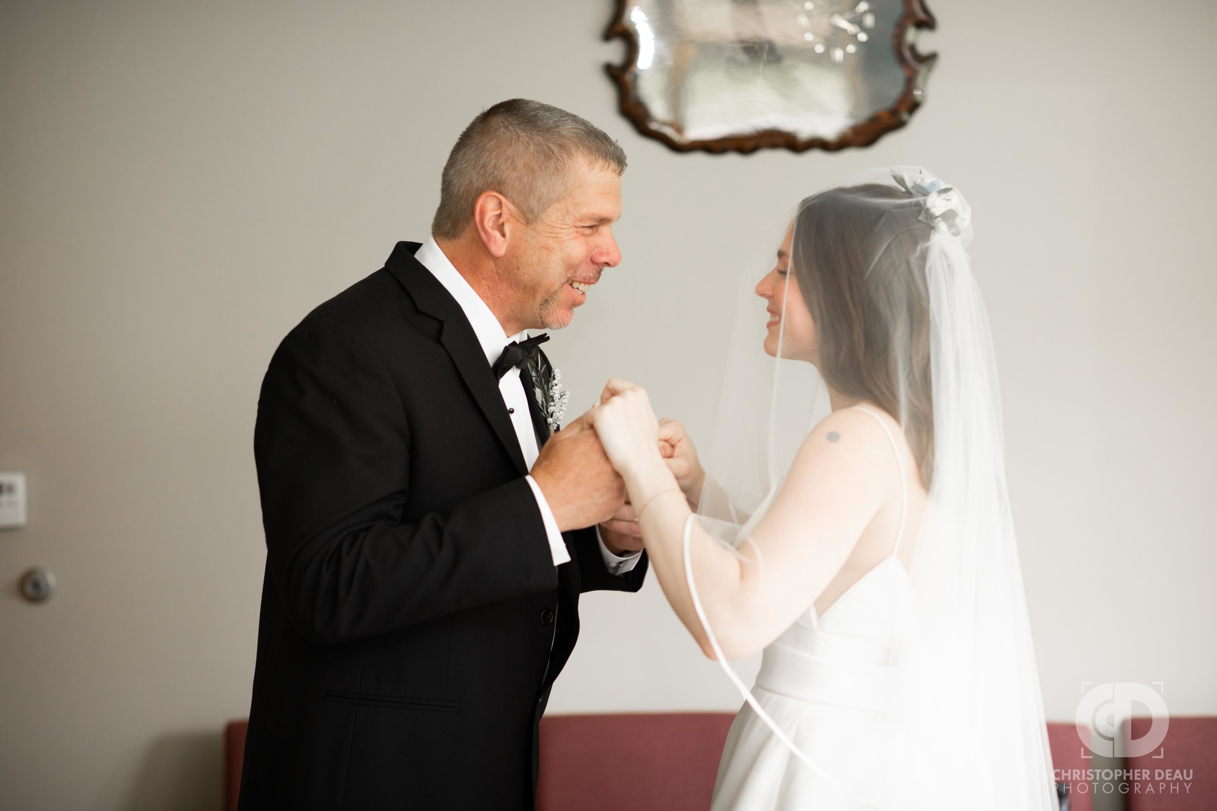  father seeing his daughter in her wedding dress first look 