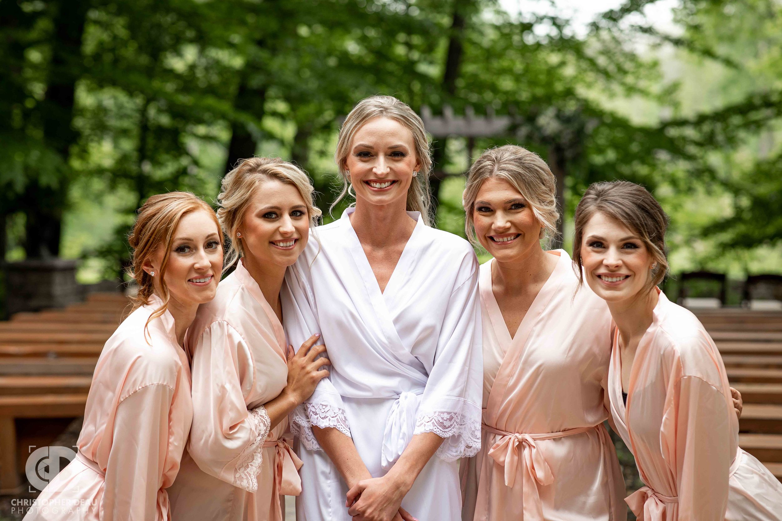  more bridesmaids in their robes 
