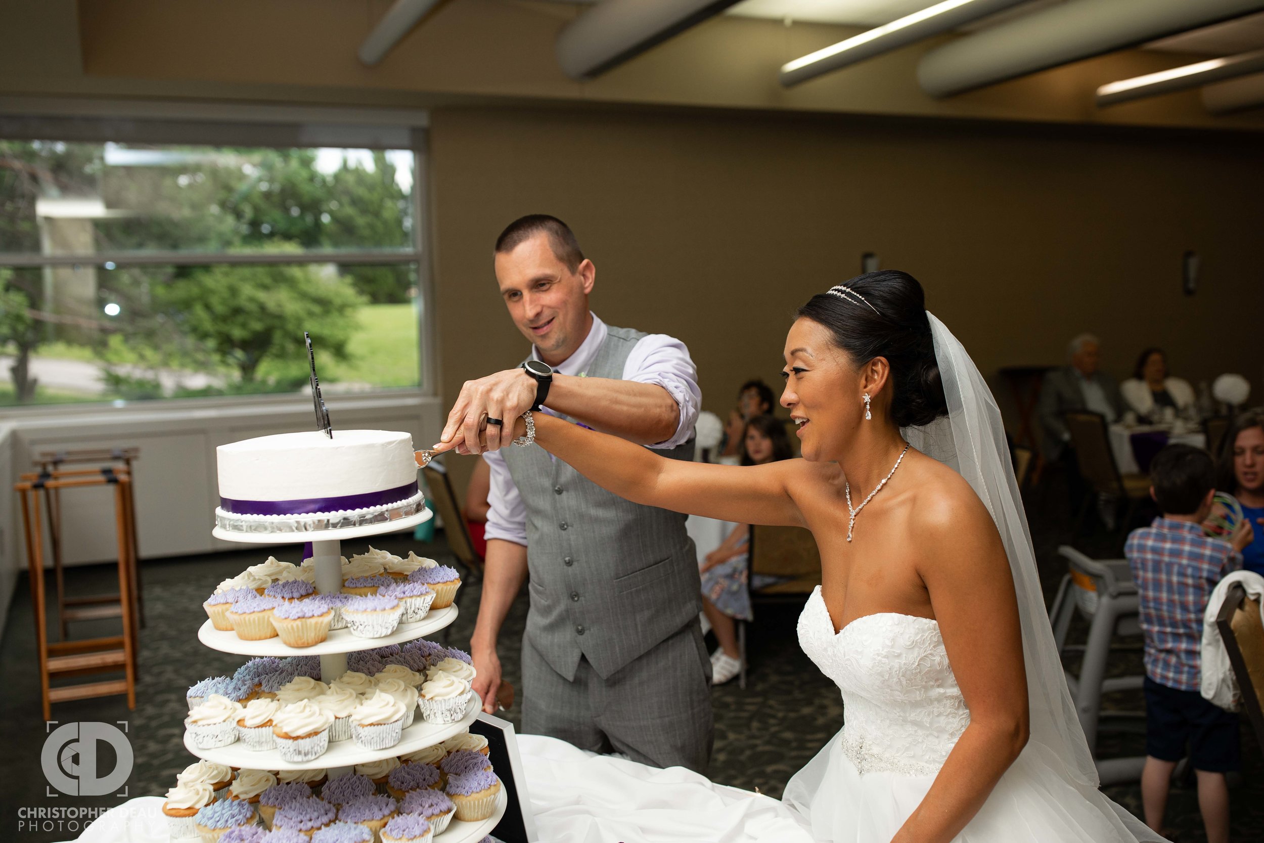  Wedding cake cutting at WMU Fetzer Center 