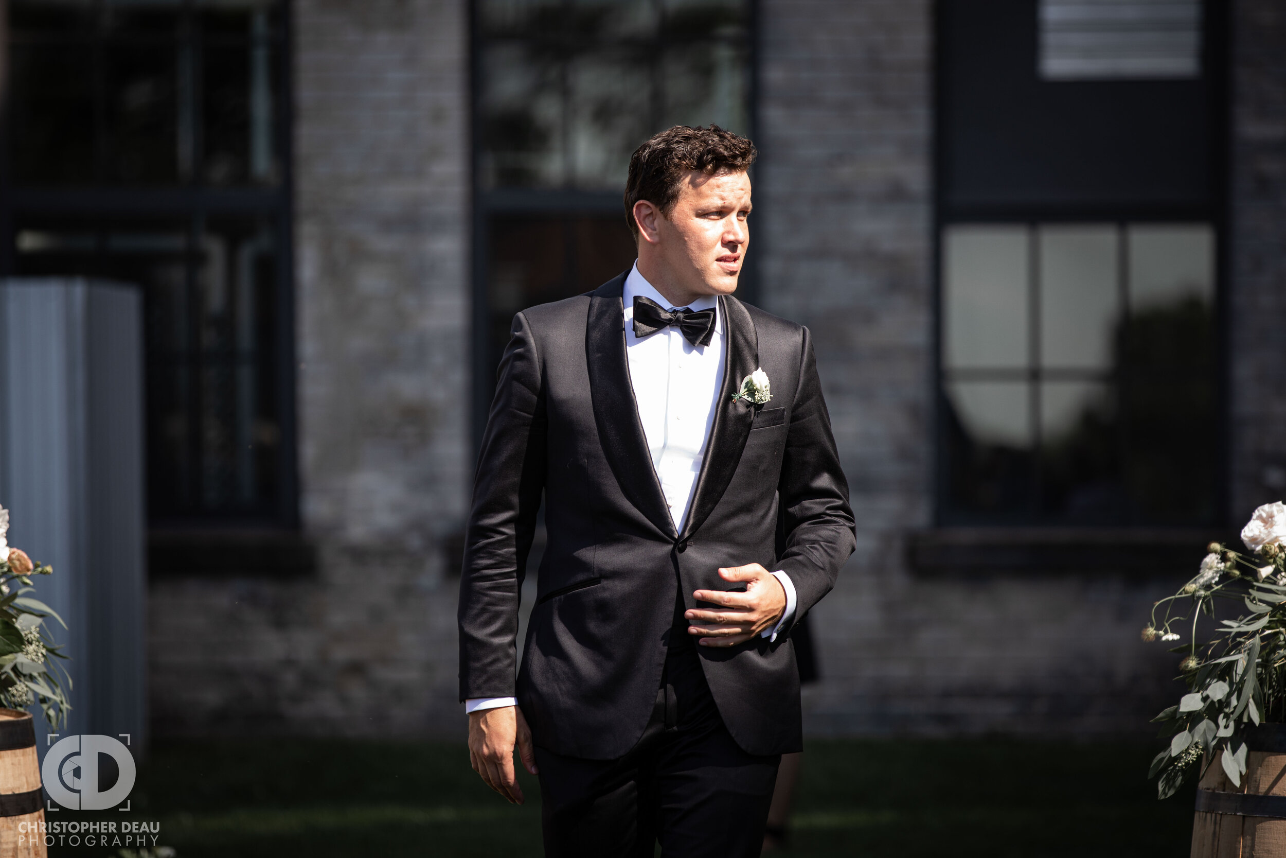  Groom walks down the aisle  