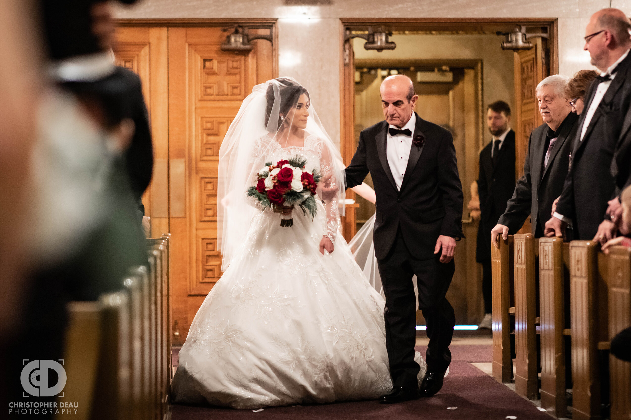  The father of the bride walks his daughter down the aisle  