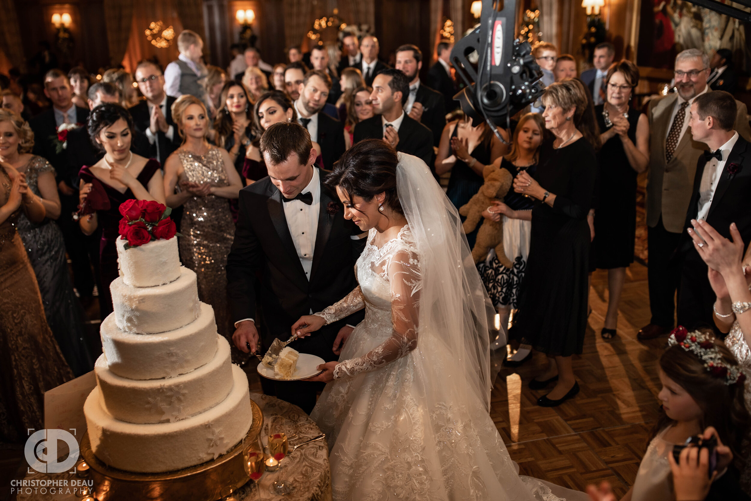  The bride and groom cut the wedding cake 