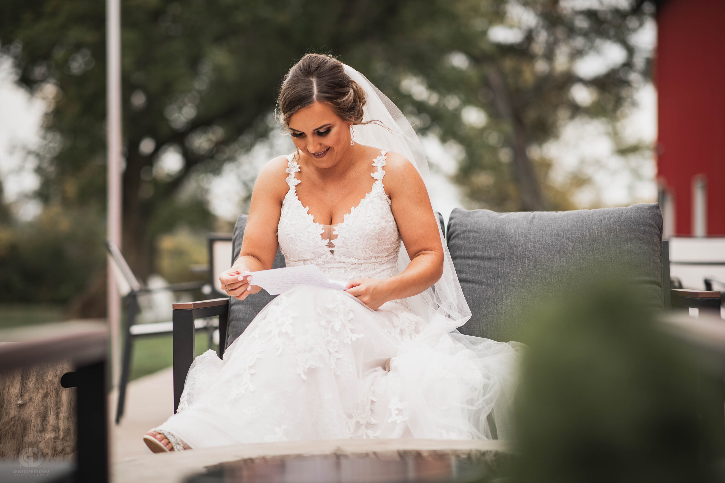  bride reading a letter from the groom 