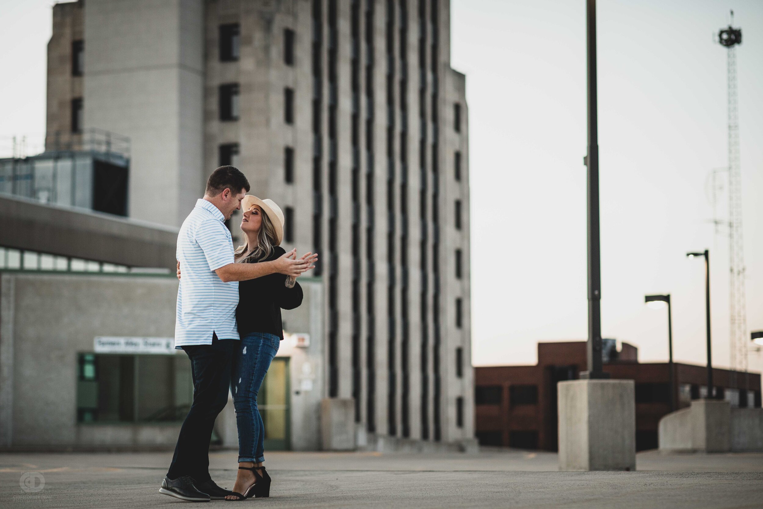 A couple dancing together on top of a parking structure over downtown Kalamazoo.jpg
