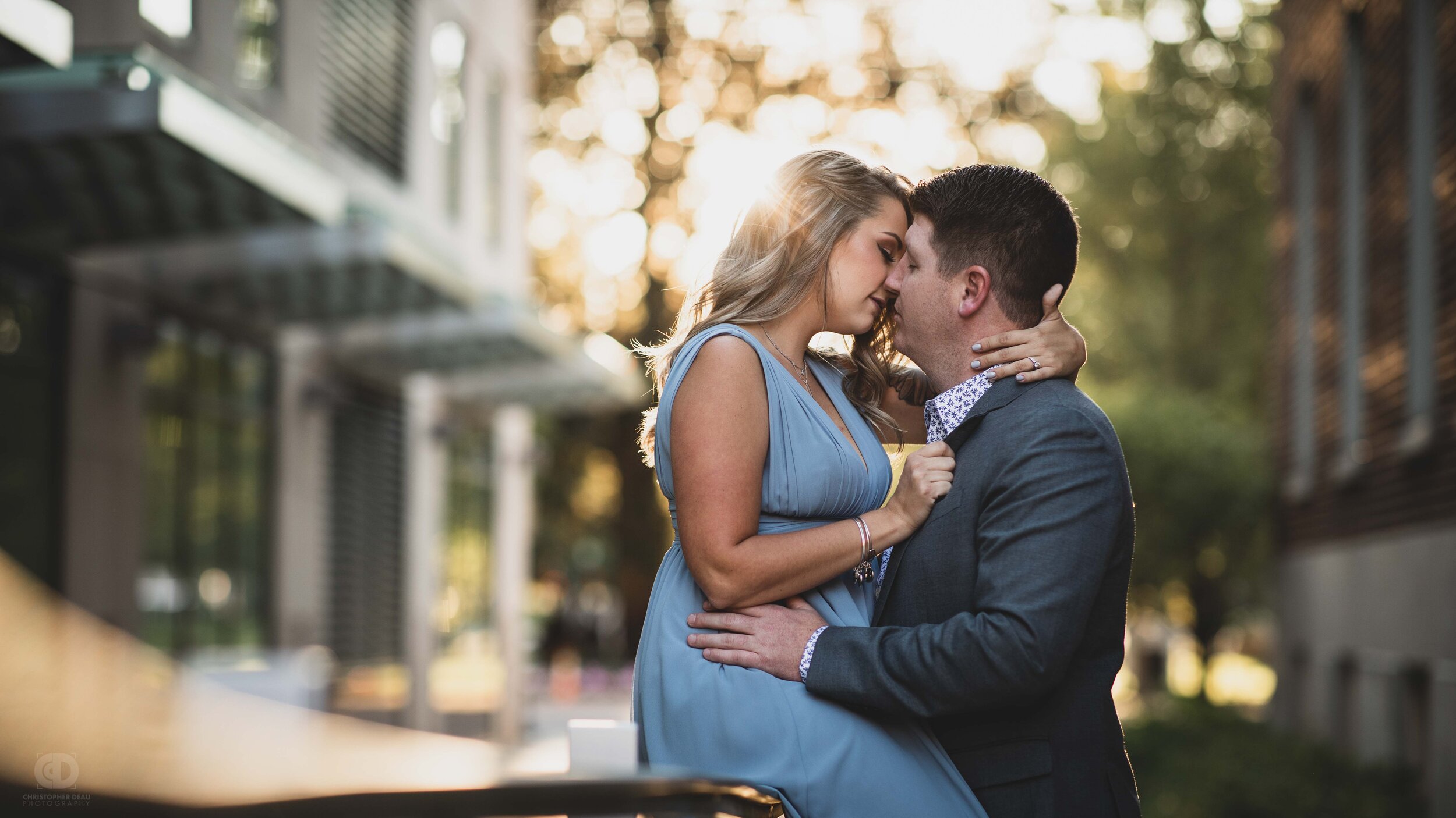 A couple sharing romantic moment during sunset in Kalamazoo.jpg