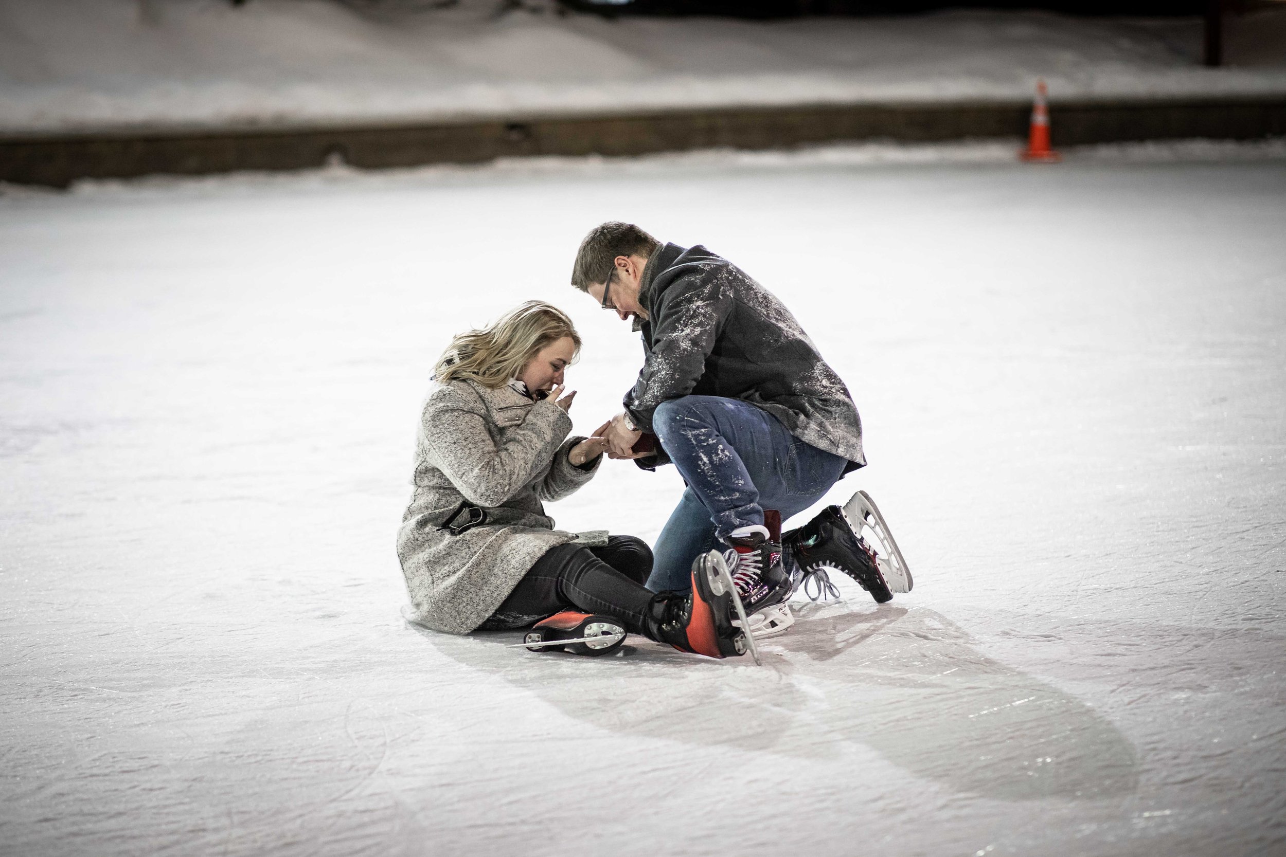  couple falls down skating during proposal 