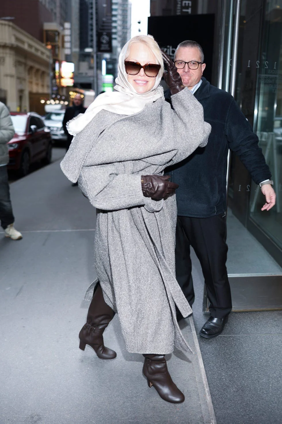 Pamela Anderson’s Ferragamo Look Feels Like a Modern Grace Kelly Moment