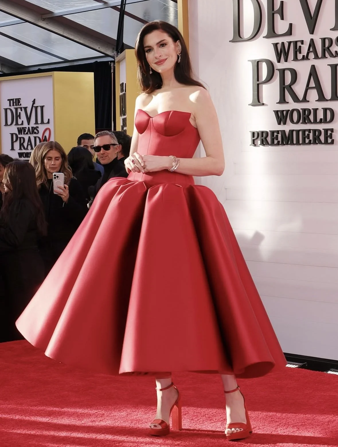 Andy Sachs, Rewritten in Red: Anne Hathaway Stuns in Custom Louis Vuitton