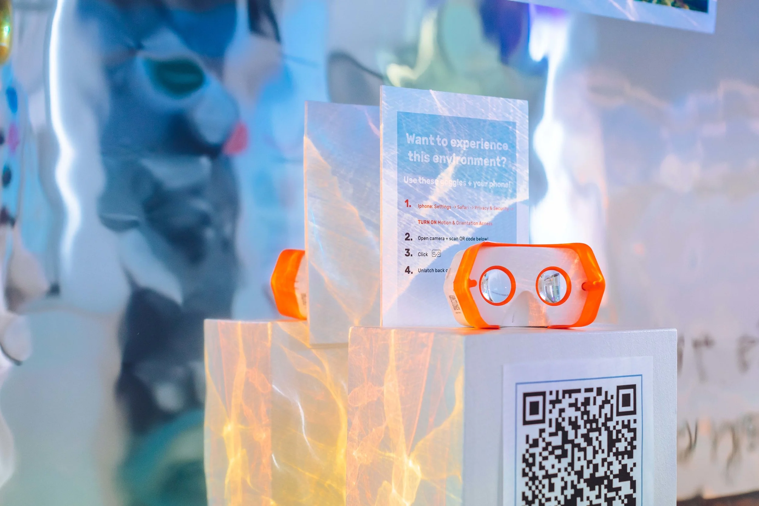 Google Cardboard googles were placed below each rendering. Scanning the QR code opened up the 2D rendering - but now in a virtual reality environment.