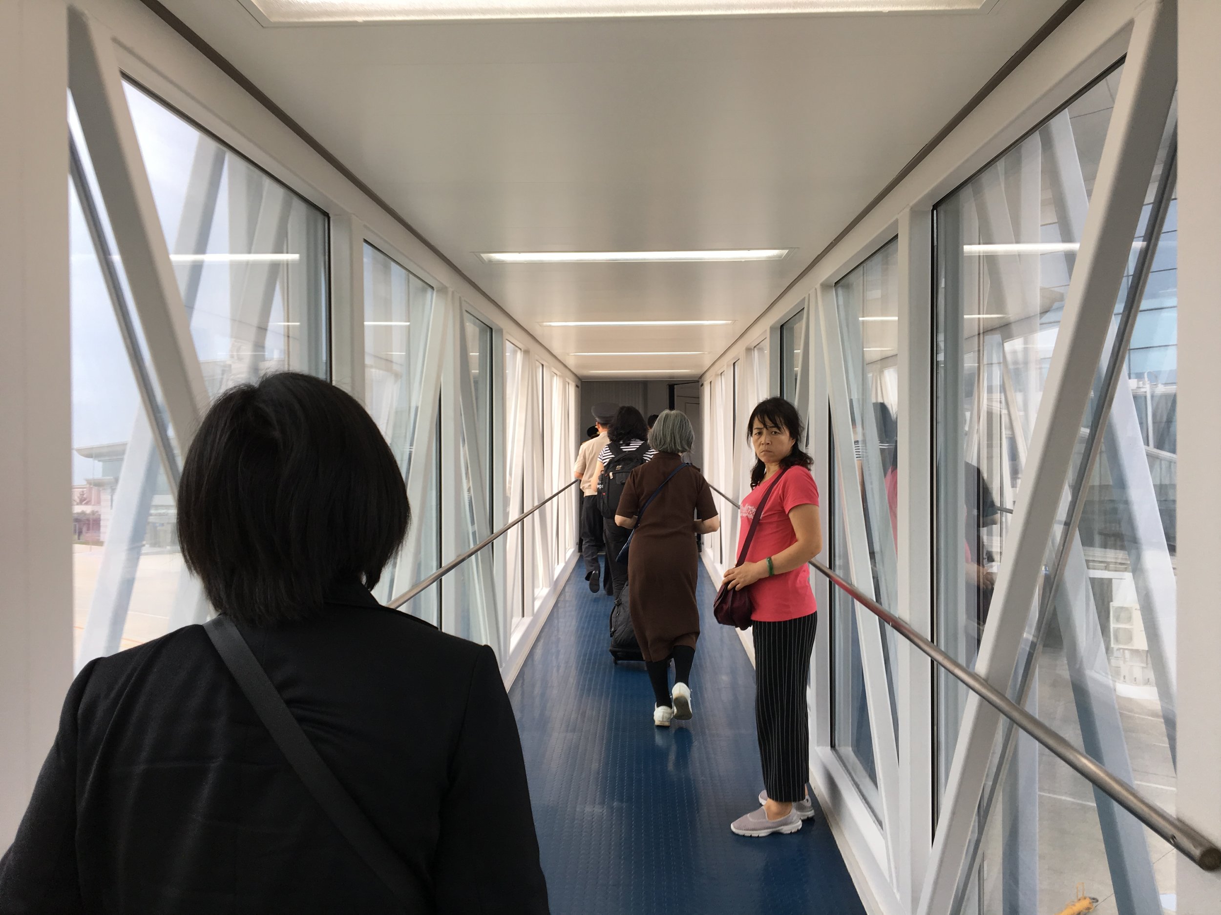 Confused Chinese tourists at Pyongyang Sunan International Airport