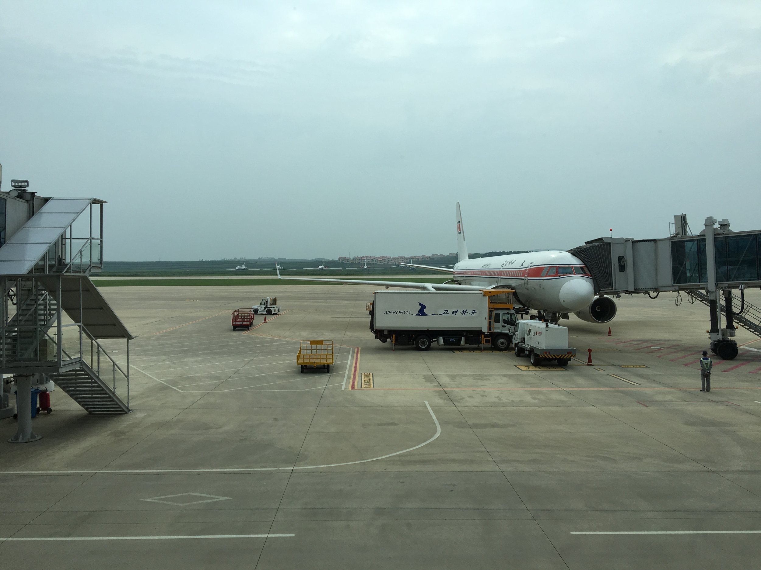Air Koryo TU204 parked at the gate of Pyongyang Sunan International Airport