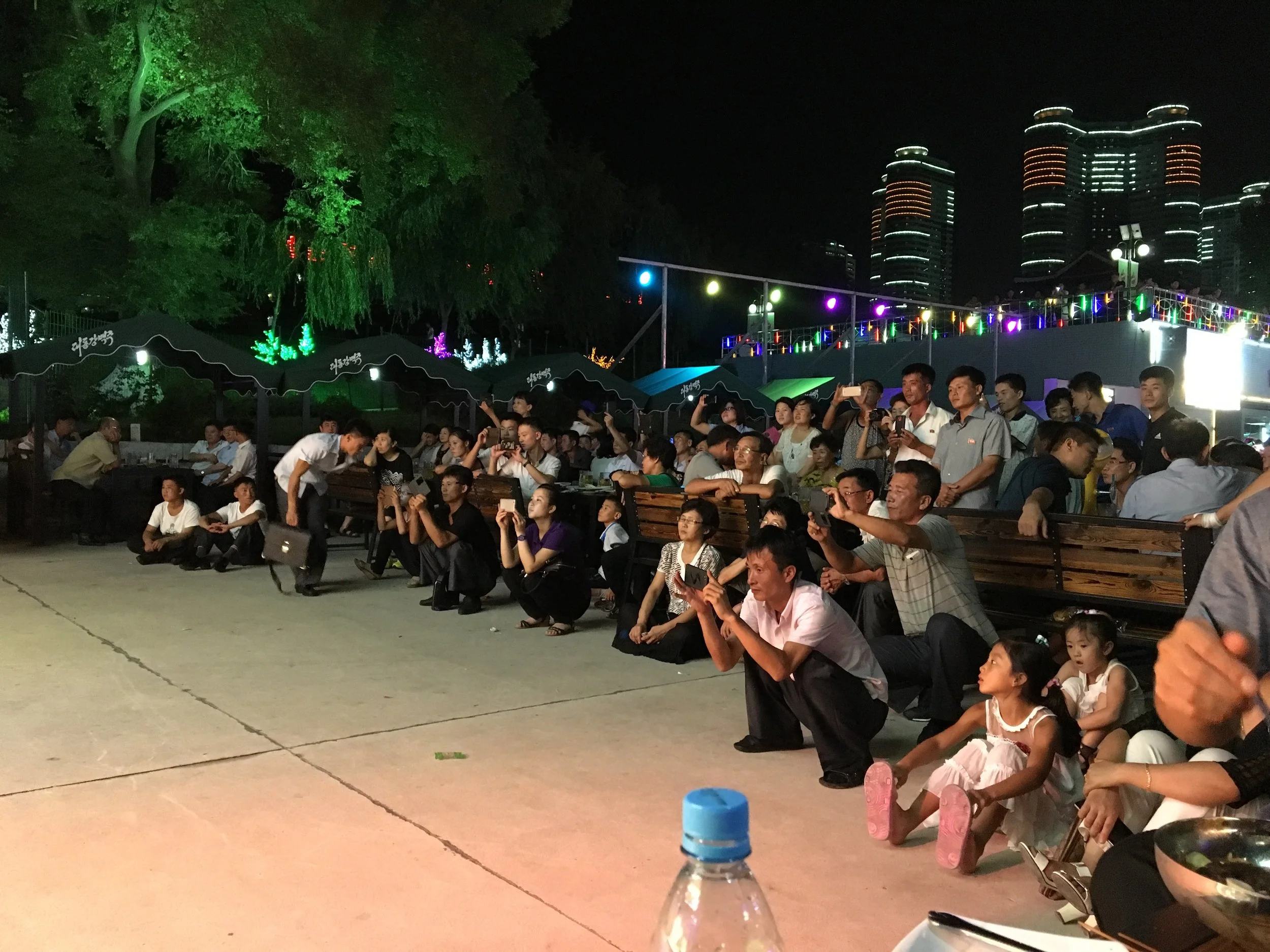  Audience recording the performance 