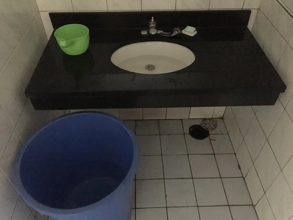  Rest area restroom with no running water 