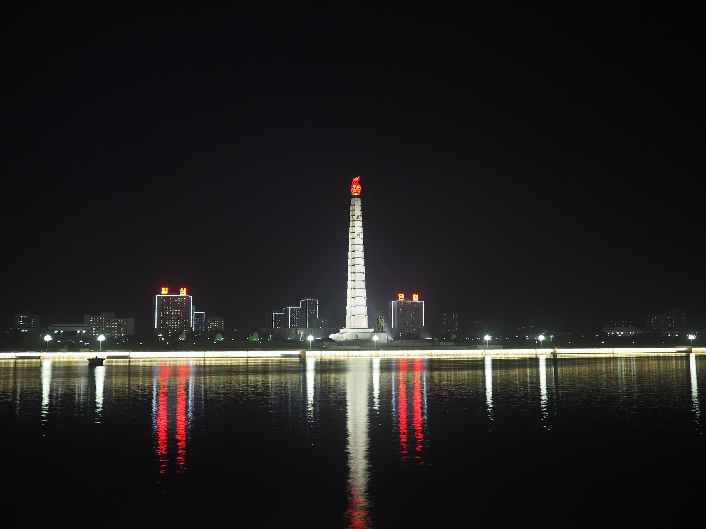 The Juche Tower at night