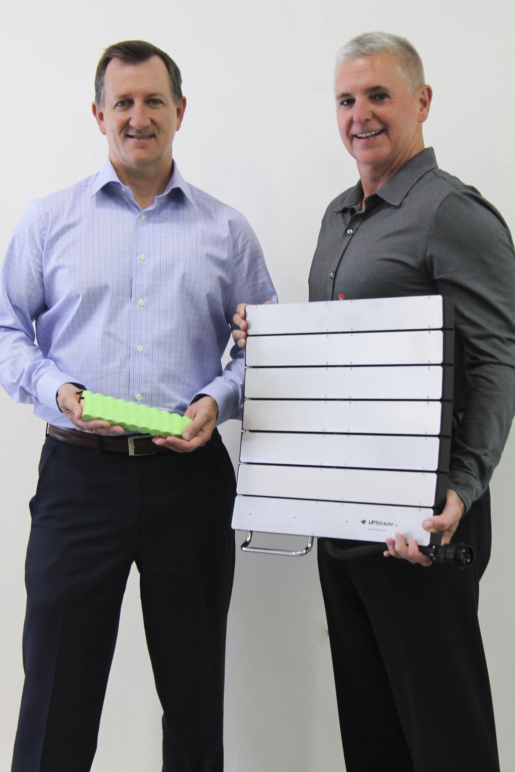 ZincFive’s Tod Higinbotham & Tim Hysell with the patented nickel-zinc cells and UPStealth Battery Backup System