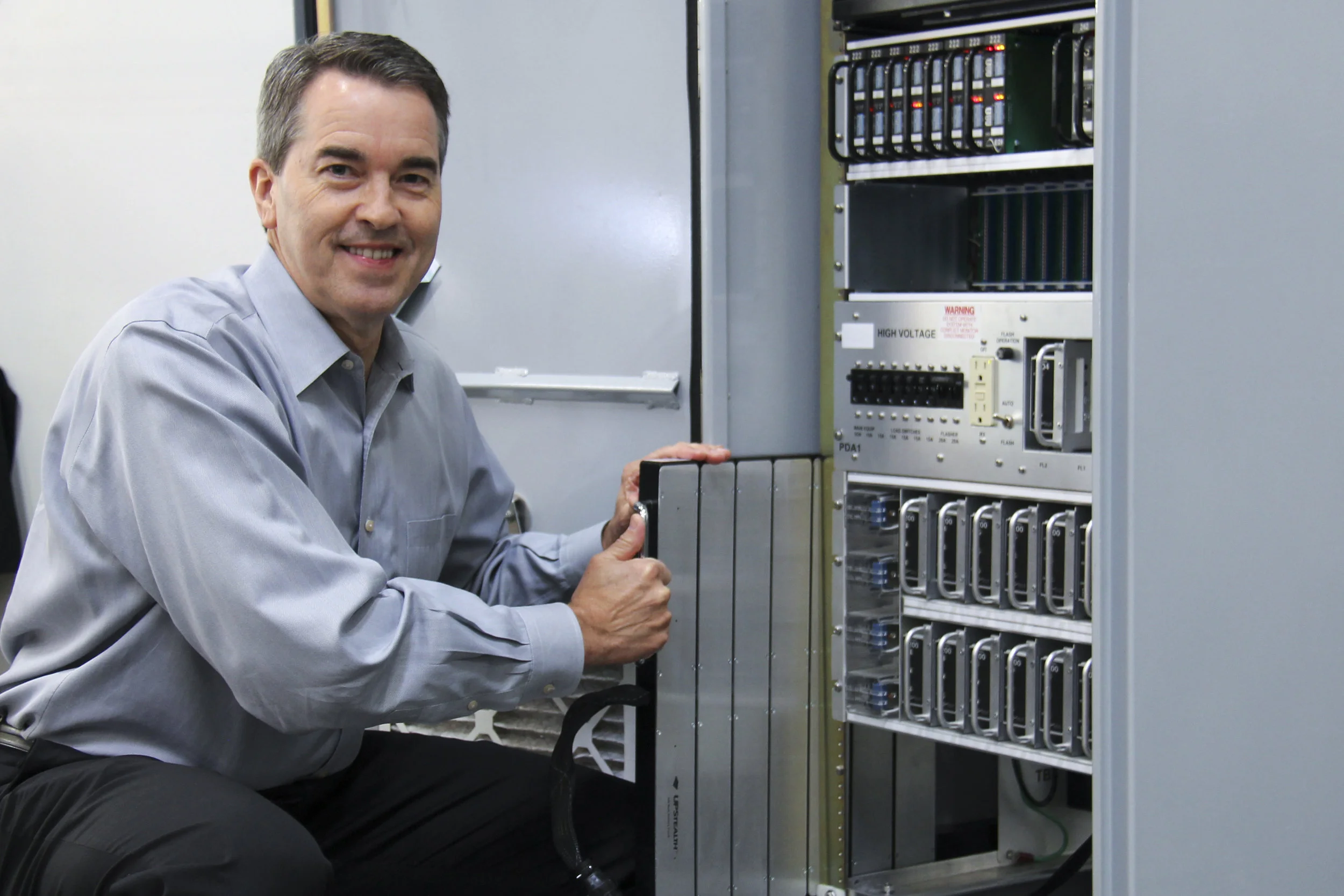 ZincFive's VP Sales - Traffic Solutions, Pete Johnson demonstrates how the UPStealth fits into existing space inside traffic cabinets.