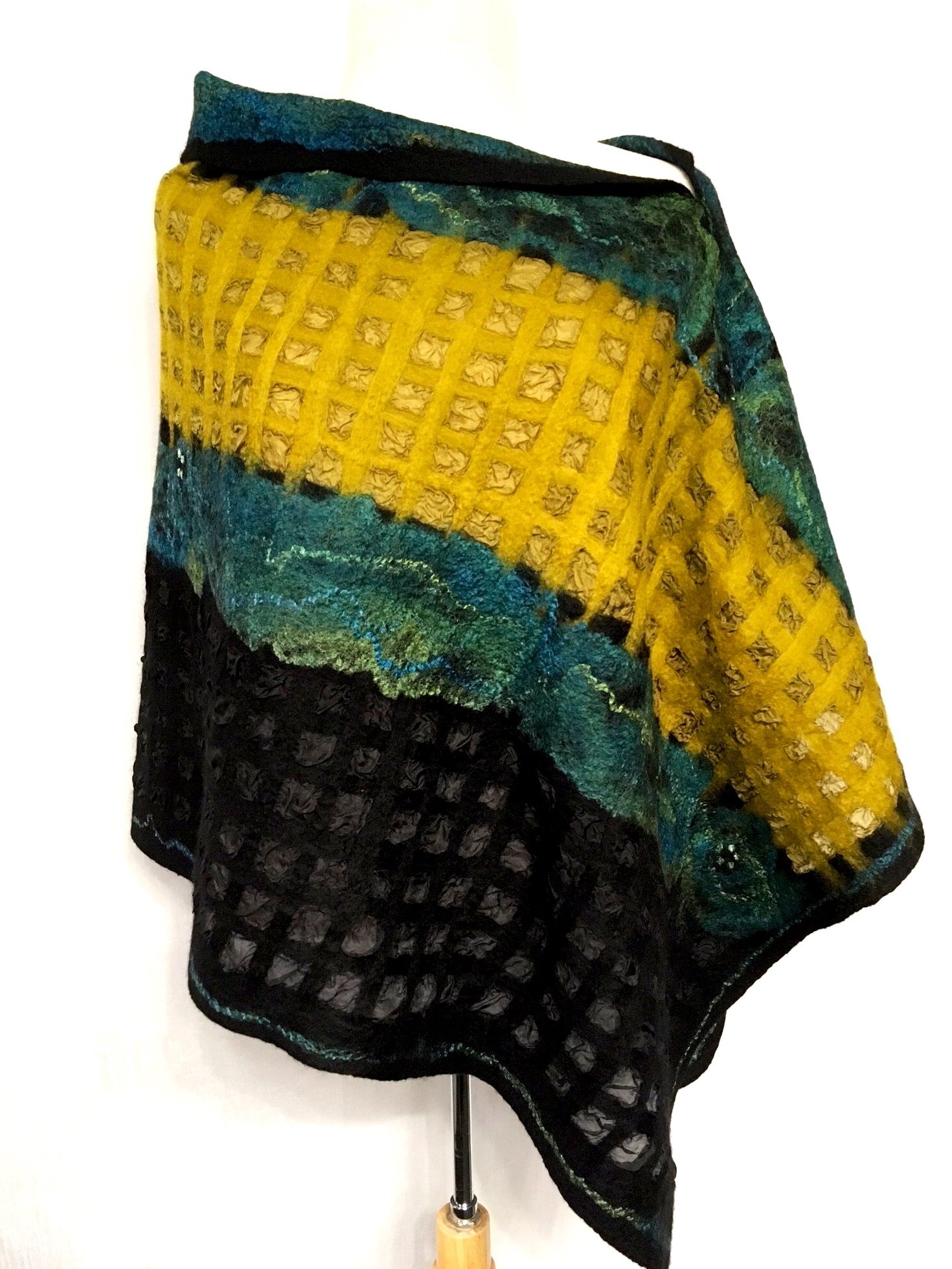 Poncho: $450, 31”x23”, Nuno felt, silk & wool