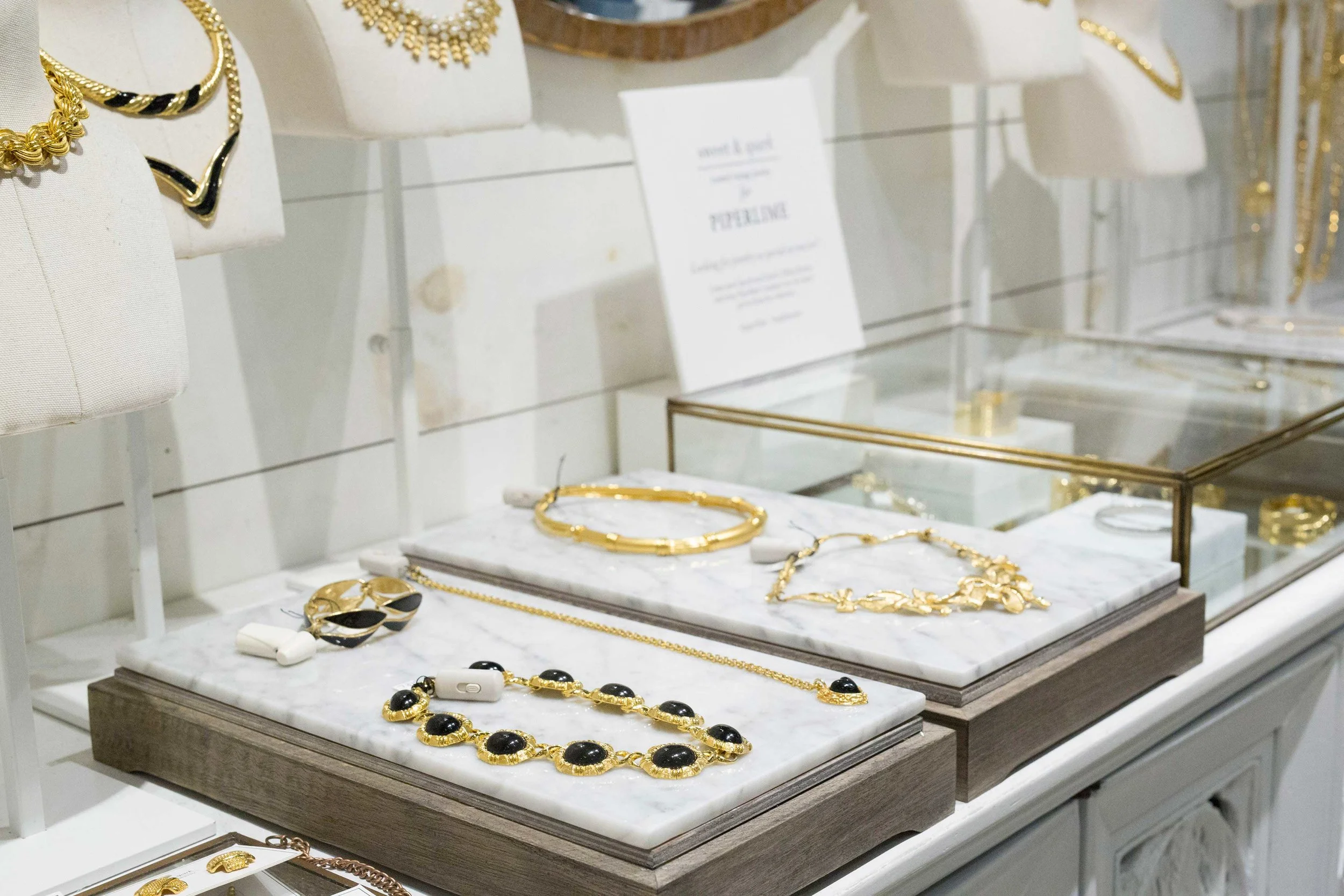 Marble displays & delicate glass cabinets were designed and placed throughout the store, mainly featuring our key jewelry accessories.