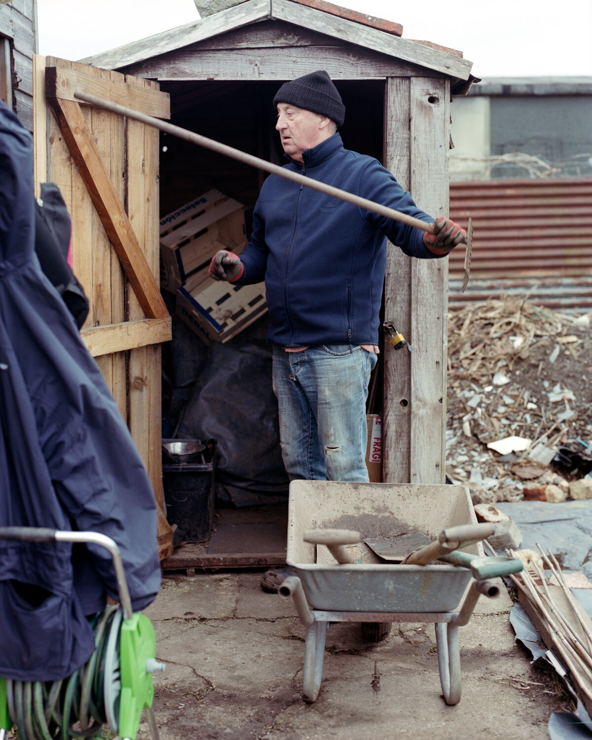18) John Putting Stuff Away In His Shed - Church Side.jpg