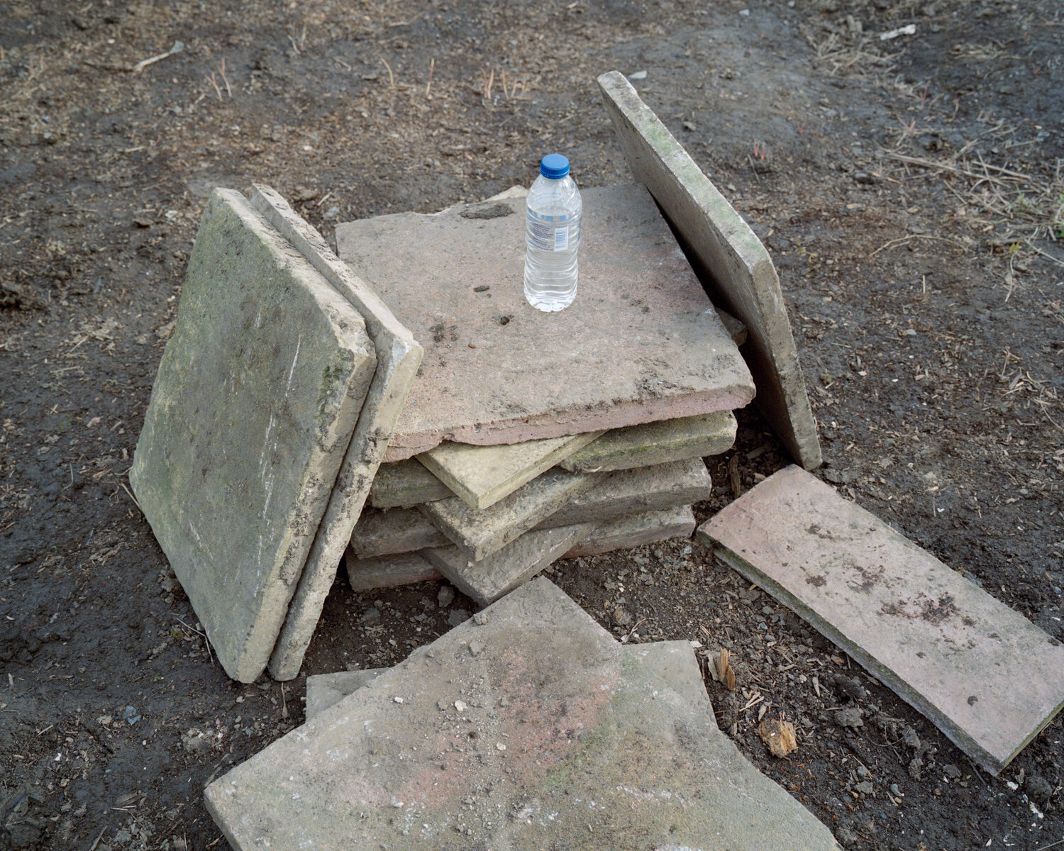 26) Paving Slabs And A Bottle Of Water - Church Side.jpg
