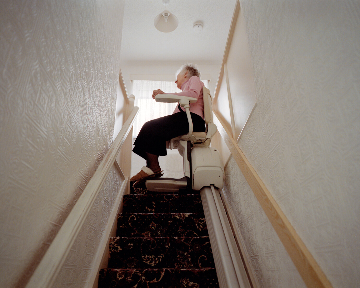 28) At The Top Of The Stairs In Her Stair Lift.jpg