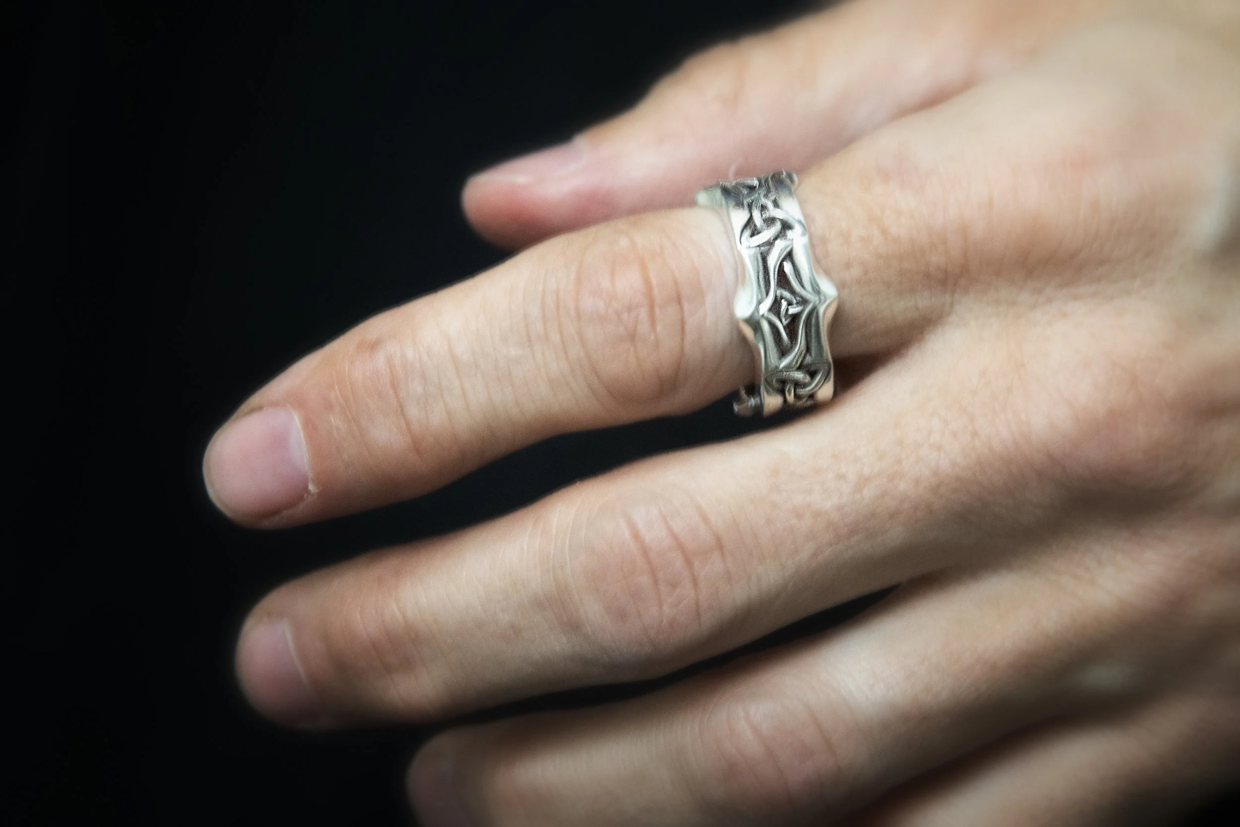 trinity knot on hand