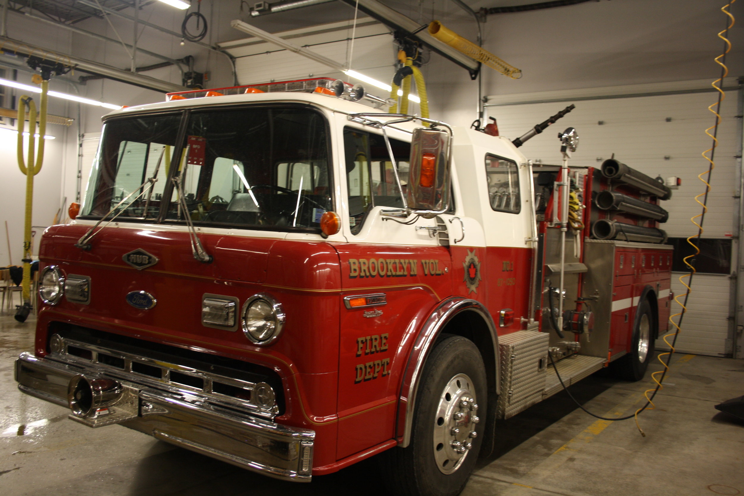 Truck one is a 1987 Ford 8000 / Hub Pumper with a 1050 GPM pump and has 800 gallons of water on board. 