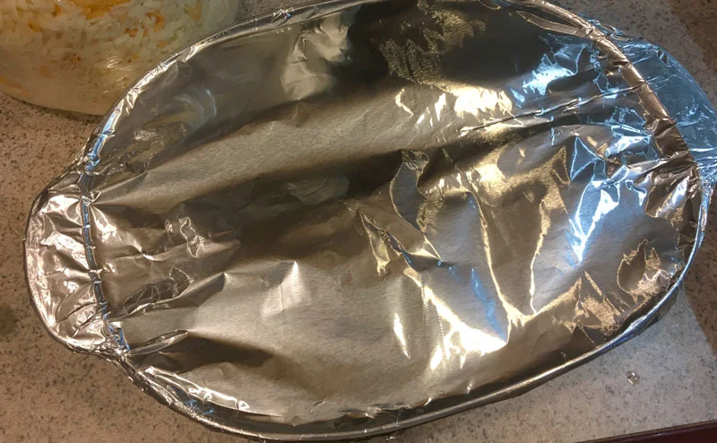 Pinch the edges of the foil covering to provide a tight seal.