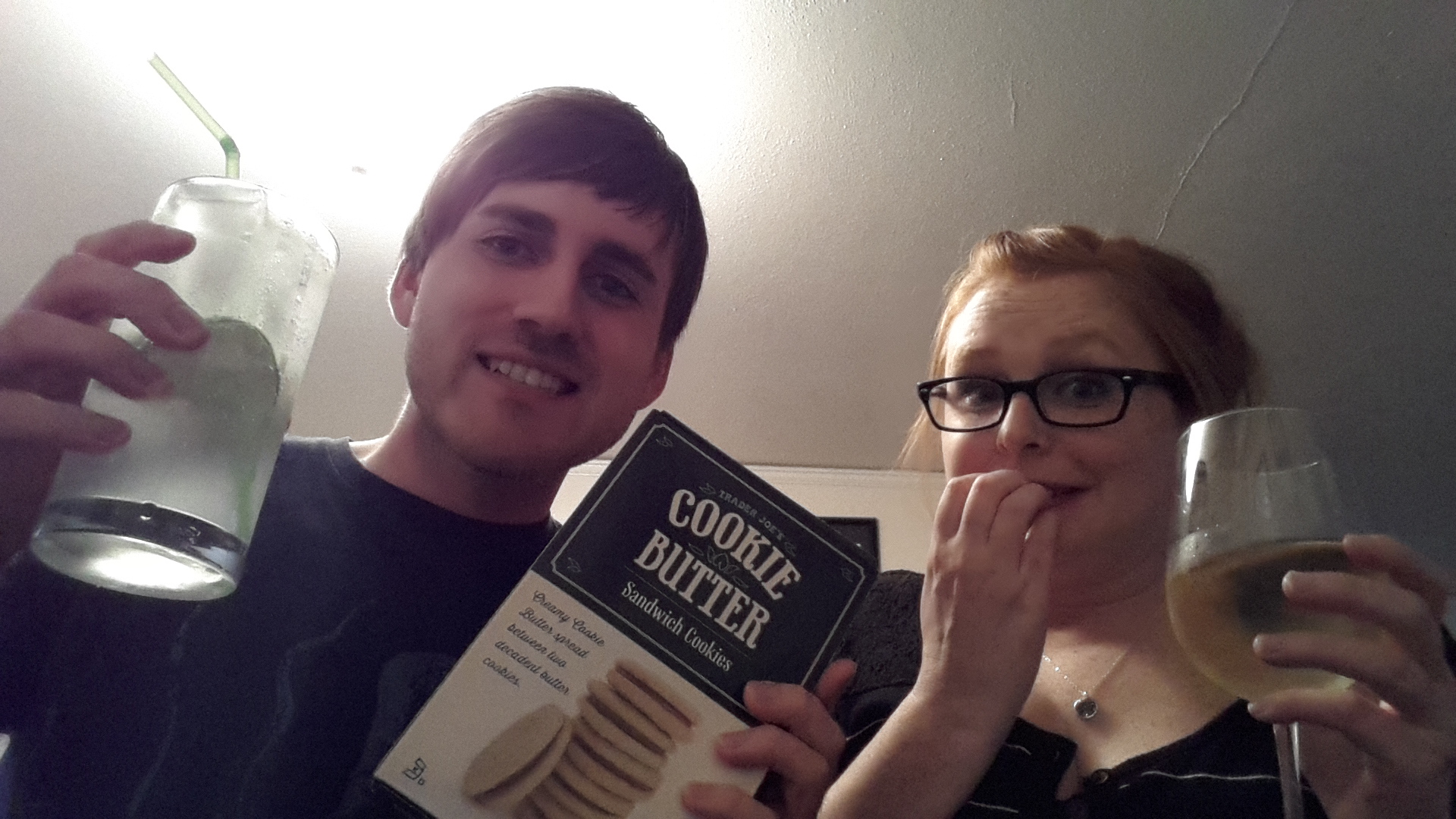 One of these people is excited, the other was promised a nice movie night.