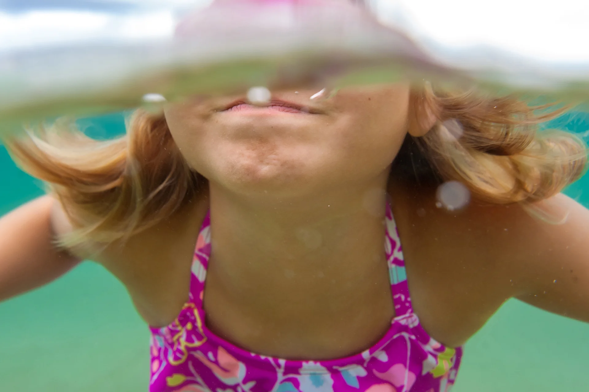 Water clarity was pretty murky here - so I got really close to minimize the amount of water between my little client and the lens.