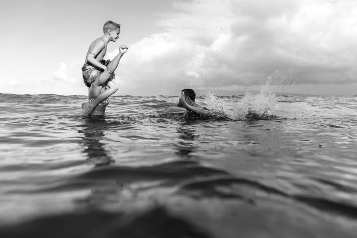 Even worse water clarity with this session, so our plans to snorkel with turtles turned into boogie boarding and chicken fights - don't limit yourself to shooting only below the surface.