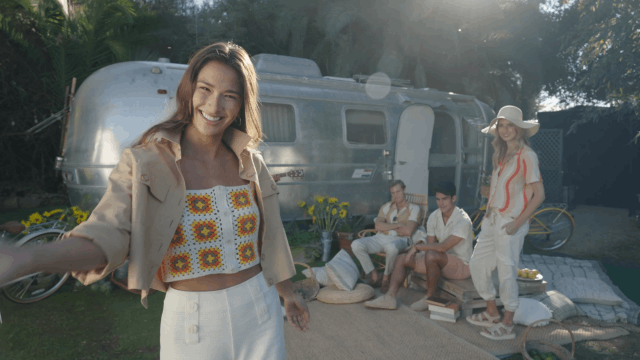 a group hangs out by an airstream.gif