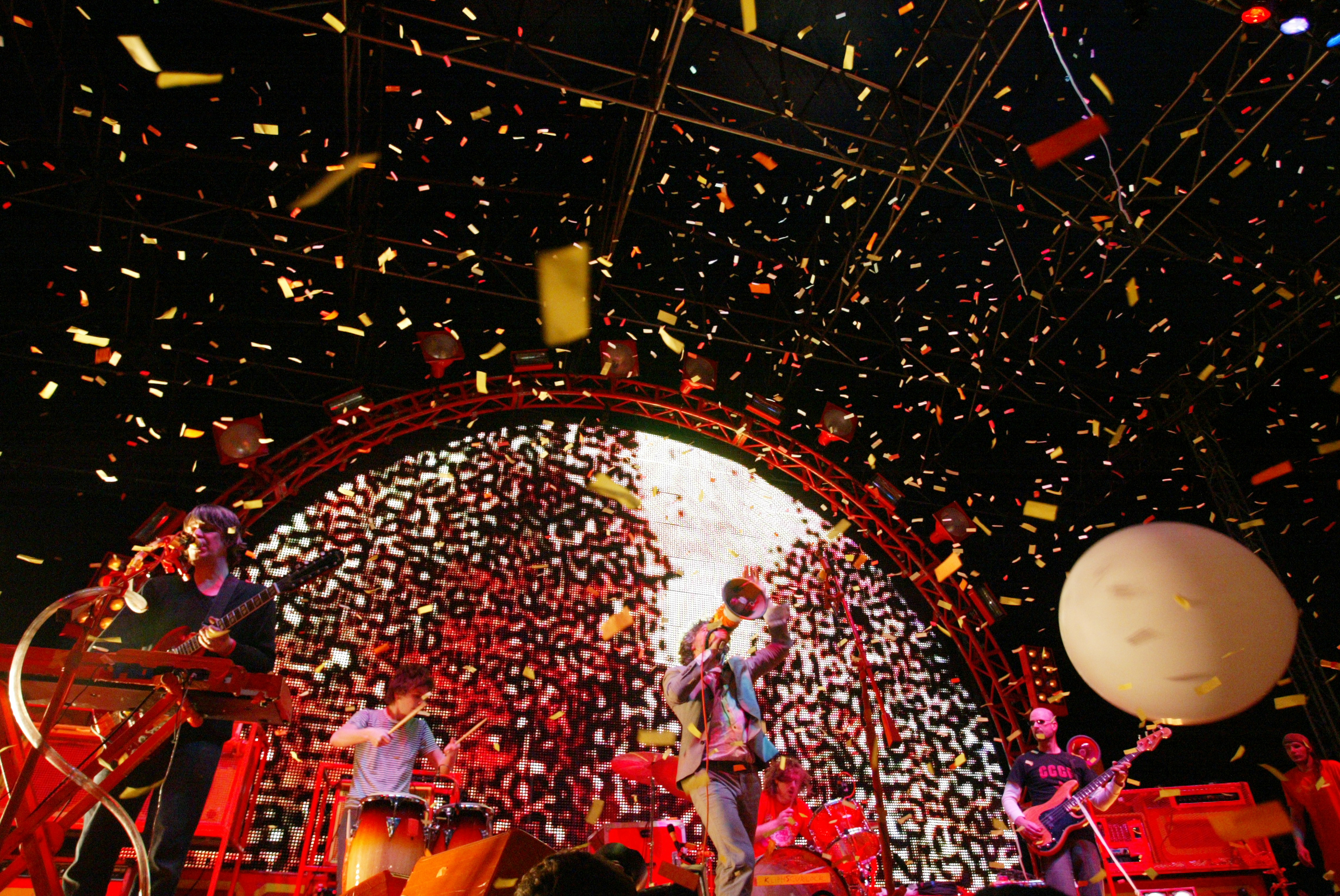 Confetti bursts across the stage as The Flaming Lips perform during NX35, Saturday, March 13, 2010 at the North Texas Fairgrounds in Denton.