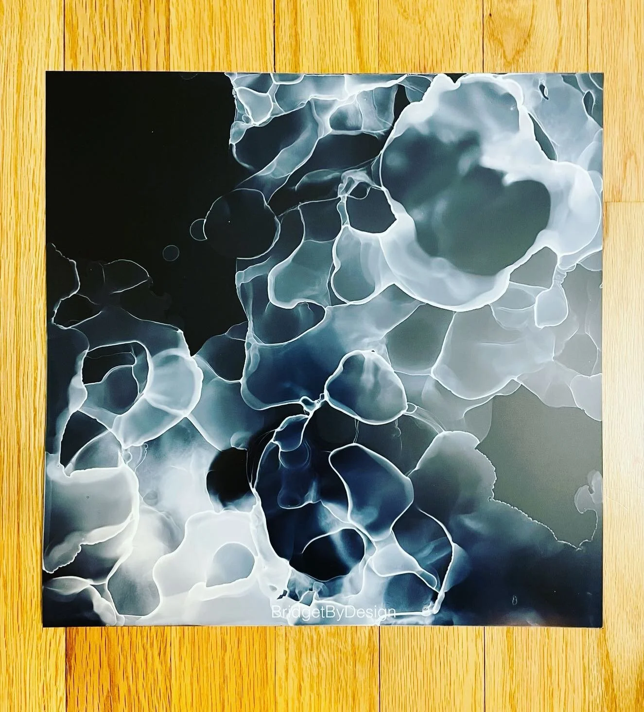 ✨LEVITATING✨ @jacquardproducts white Blanco Blanco alcohol ink used on 12&rdquo;x12&rdquo; black @narainfiniti paper 🤍🖤 #bridgetbydesign #bridgetxdesign #alcoholink #alcoholinkart #alcoholinks #alcoholinkartist #fluidart #fluidartist #monochromatic