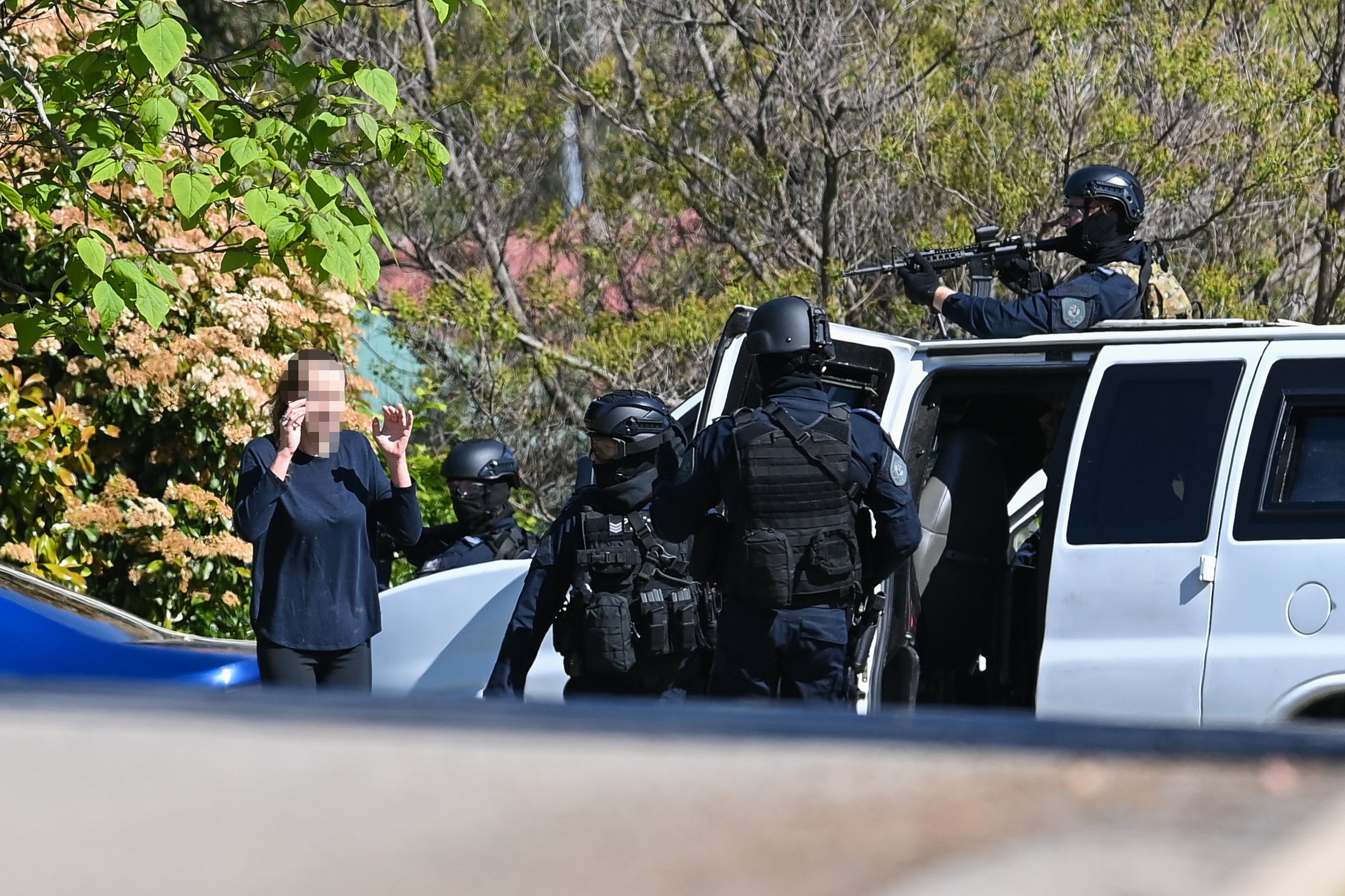  (Photo Mark Jesser) West Albury. NSW Police Tactical Operations Unit surround a house in Southern View Drive. The siege saw two people leave the house. -- believe kane harniman 