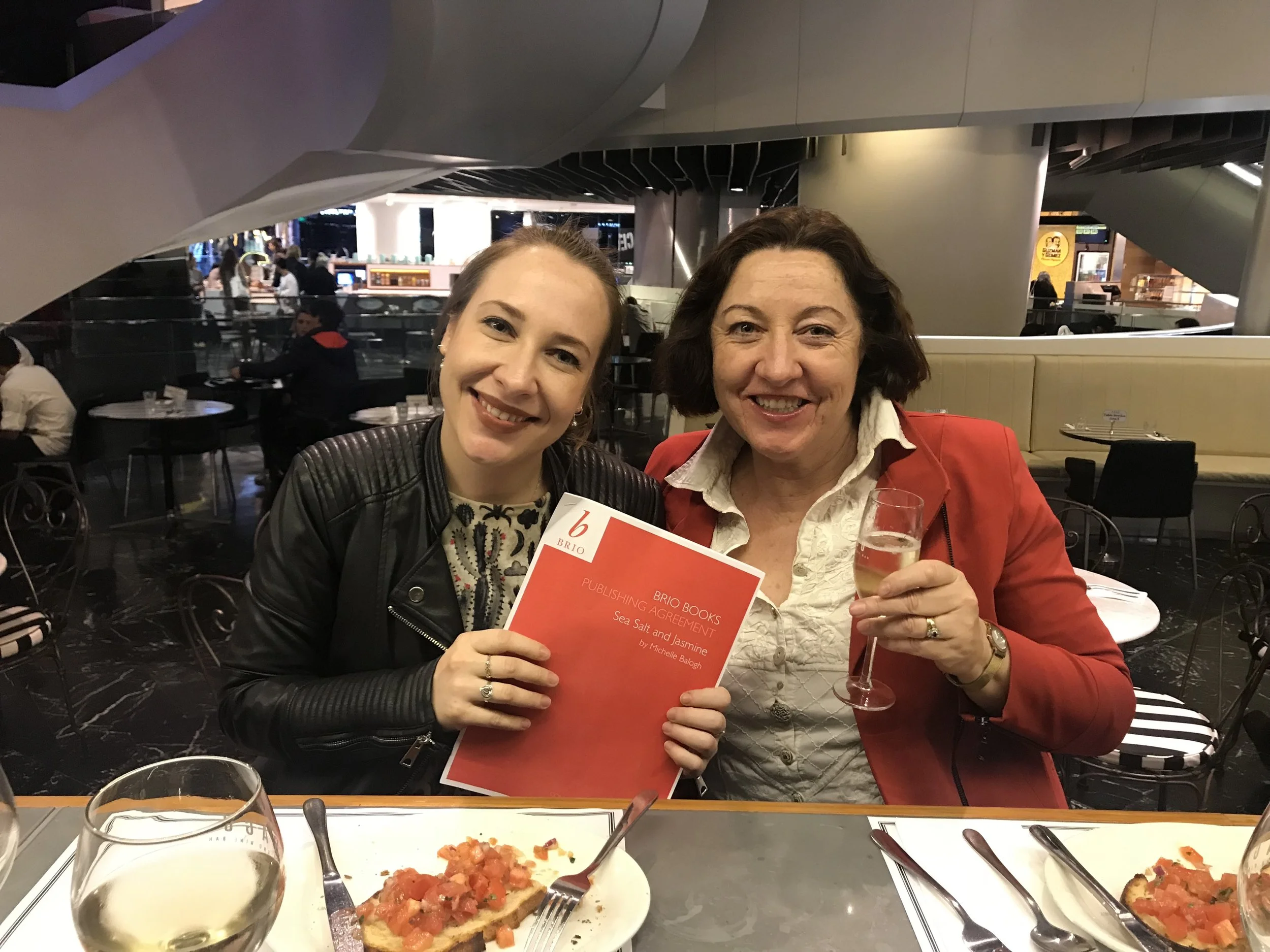 Having a drink with mum and the contract for my book deal.
