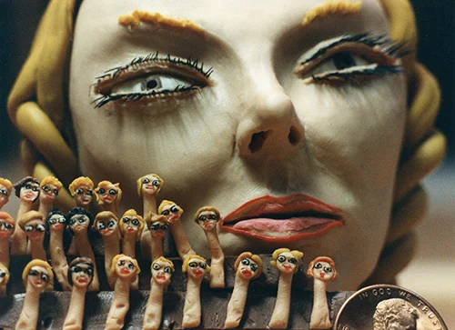 2-Clay Woman with Tiny Heads.jpg