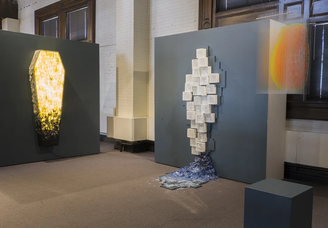Also shown here are one each of Natalie Salminen Rude and Russell Prather’s pieces in the exhibit.