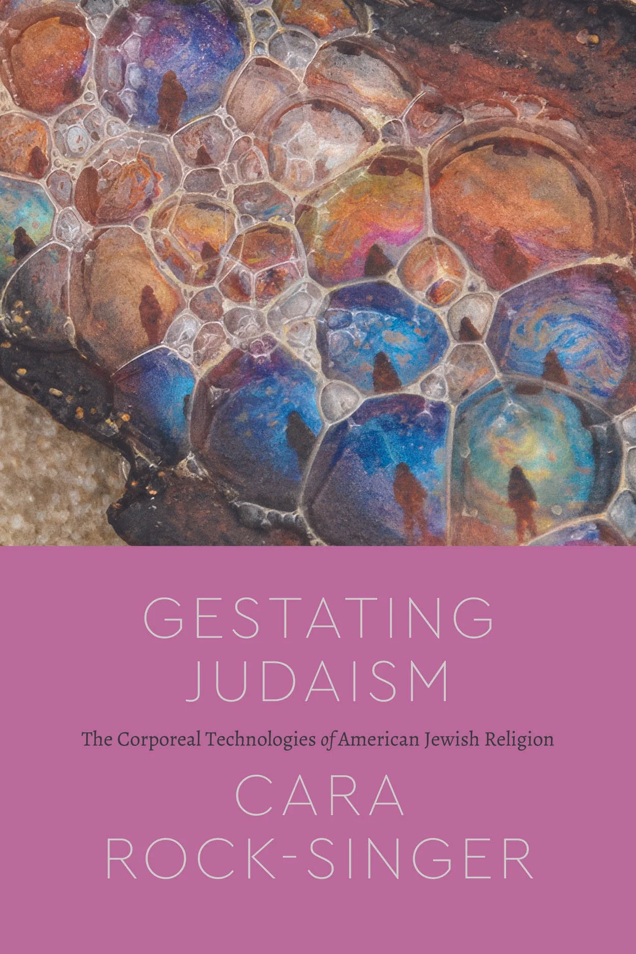 The cover of Gestating Judaism, featuring a photograph of colorful bubbles with the author's silhouette reflected in them.