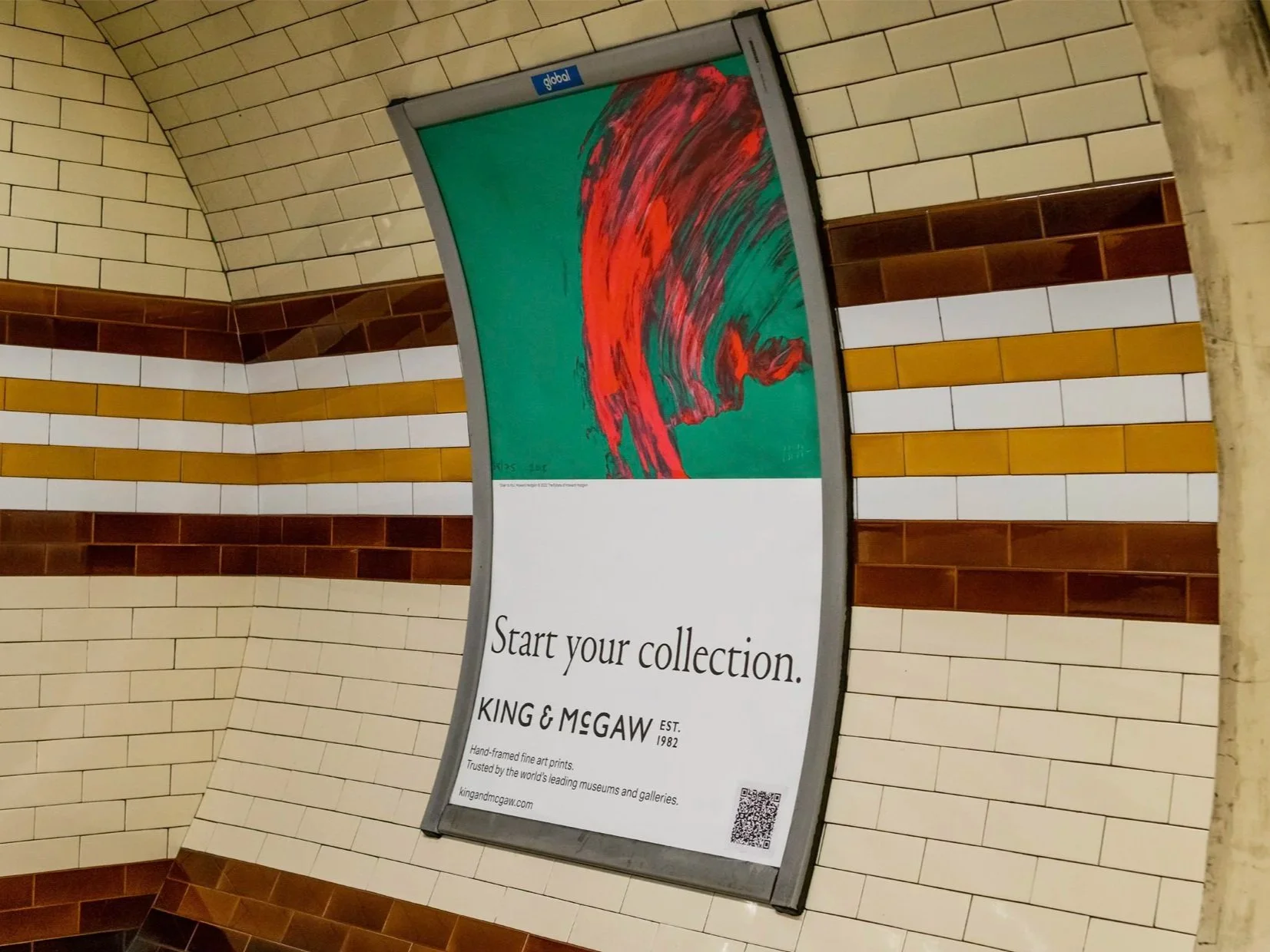 A vertical sign in a tiled subway station with an abstract artwork on top, featuring red, black, and green brush strokes on a teal background. The sign reads 'Start your collection' and promotes King & McGaw, an art printing company established in 19