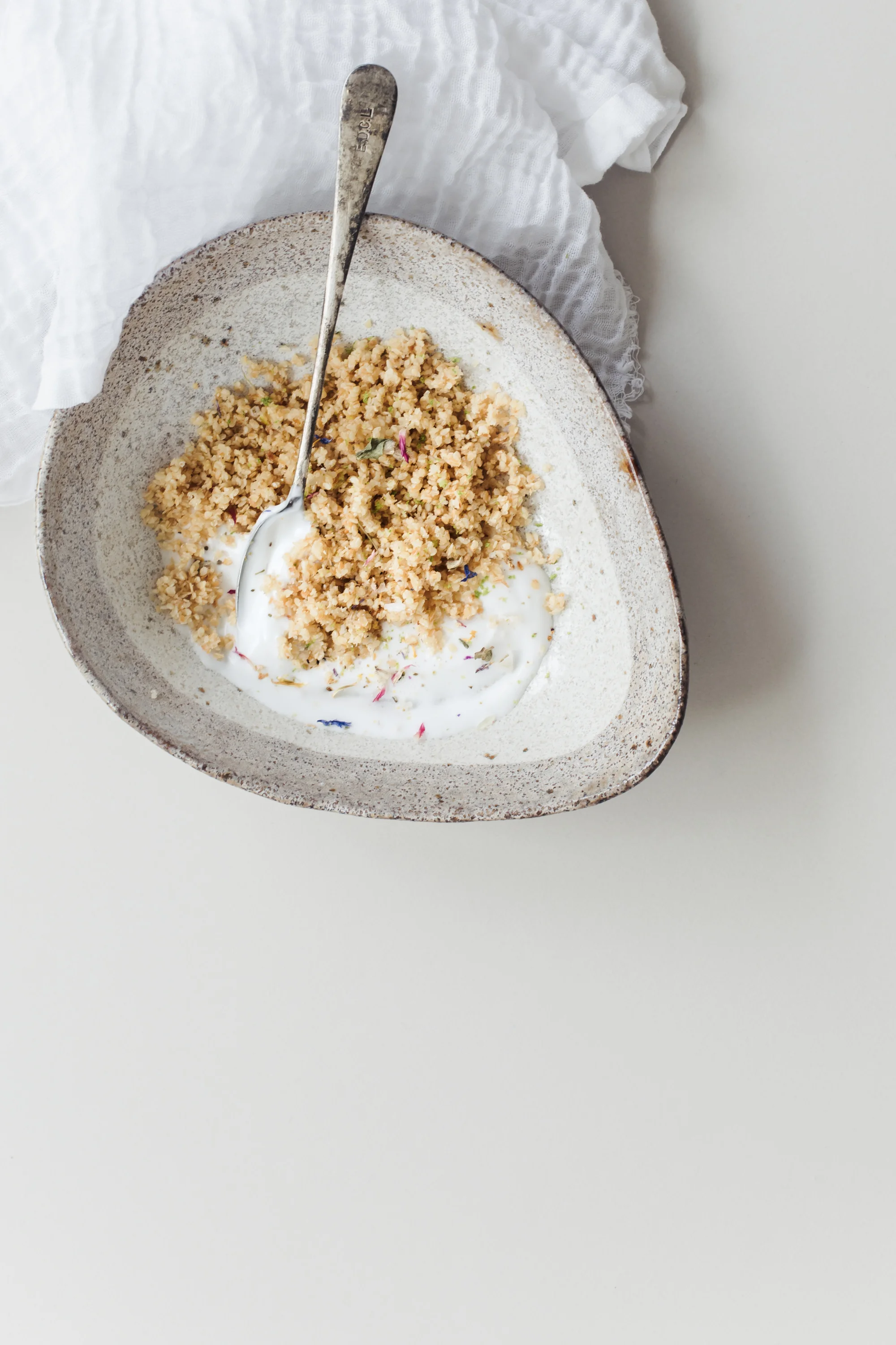 Sesame and Lime Crumble, Coconut Yogurt and Edible Flowers