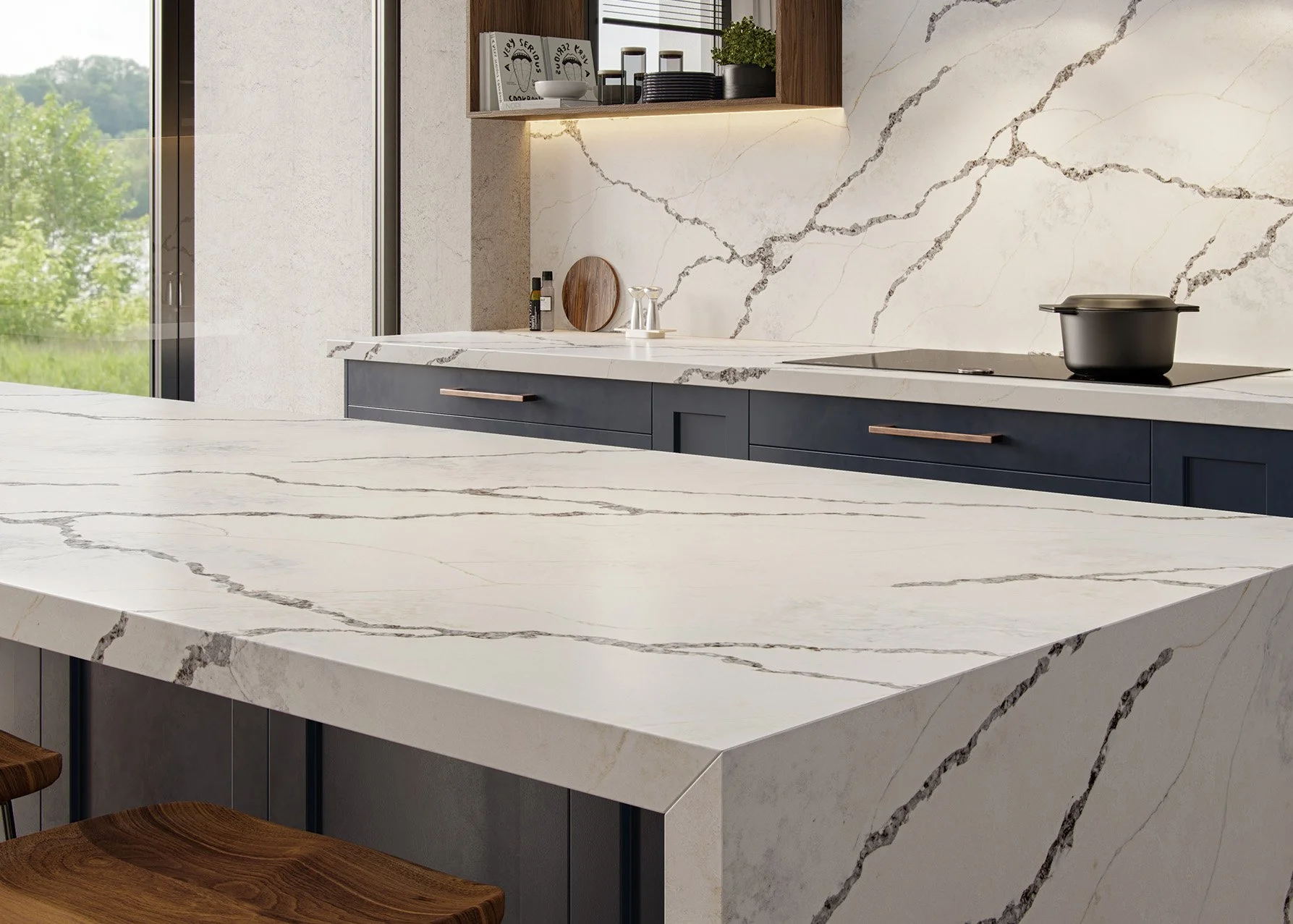 Dramatic, wide-veined, marble-style Ijen Caldera quartz island, countertop, and full-height backsplash kitchen.