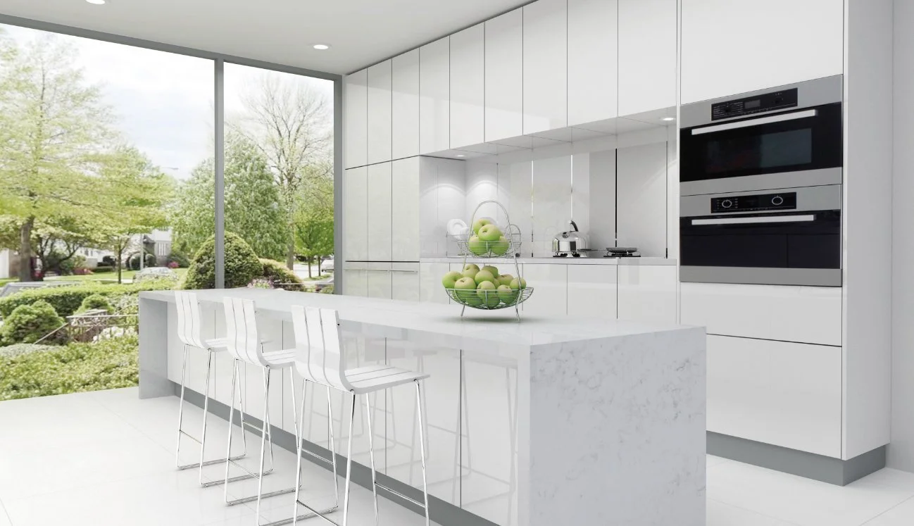 Stratus Prime Bianco Tundra quartz island in all-white kitchen.